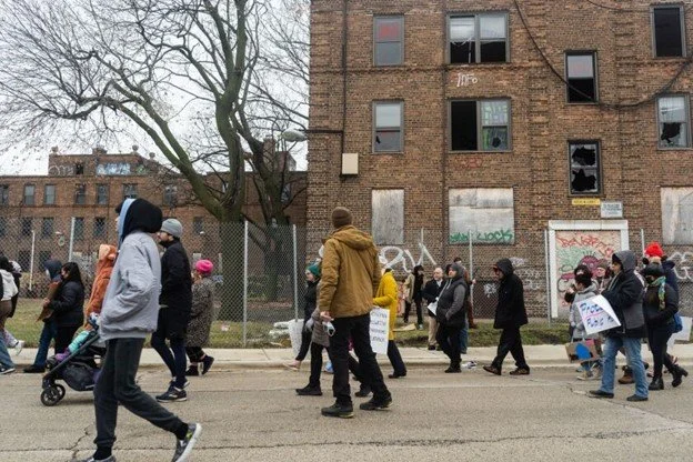 Protesters decry ‘broken promises’ on affordable housing at Lathrop Homes