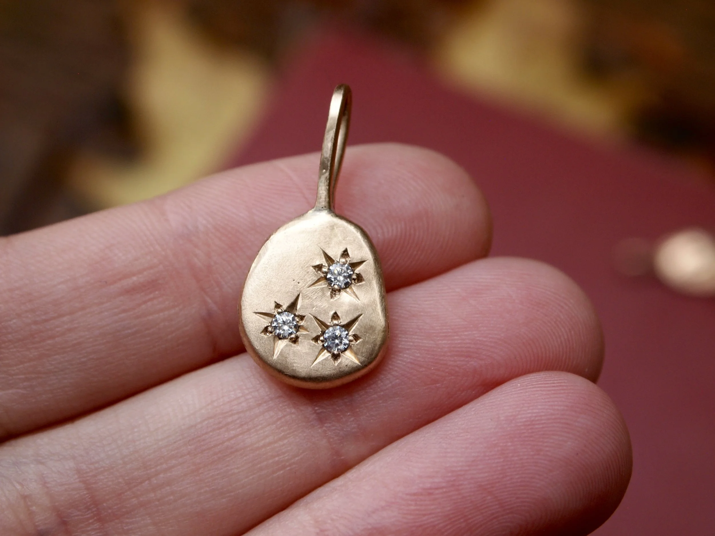 Three stars in the dark woods pendant