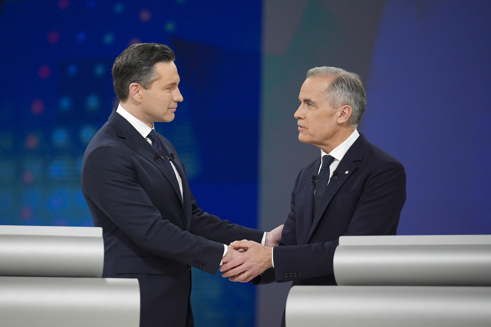 Poilievre_Carney_handshake_debate_Montreal_April2035_Christopher_Katsarov_Luna_CP174443631_1920x1280.jpg
