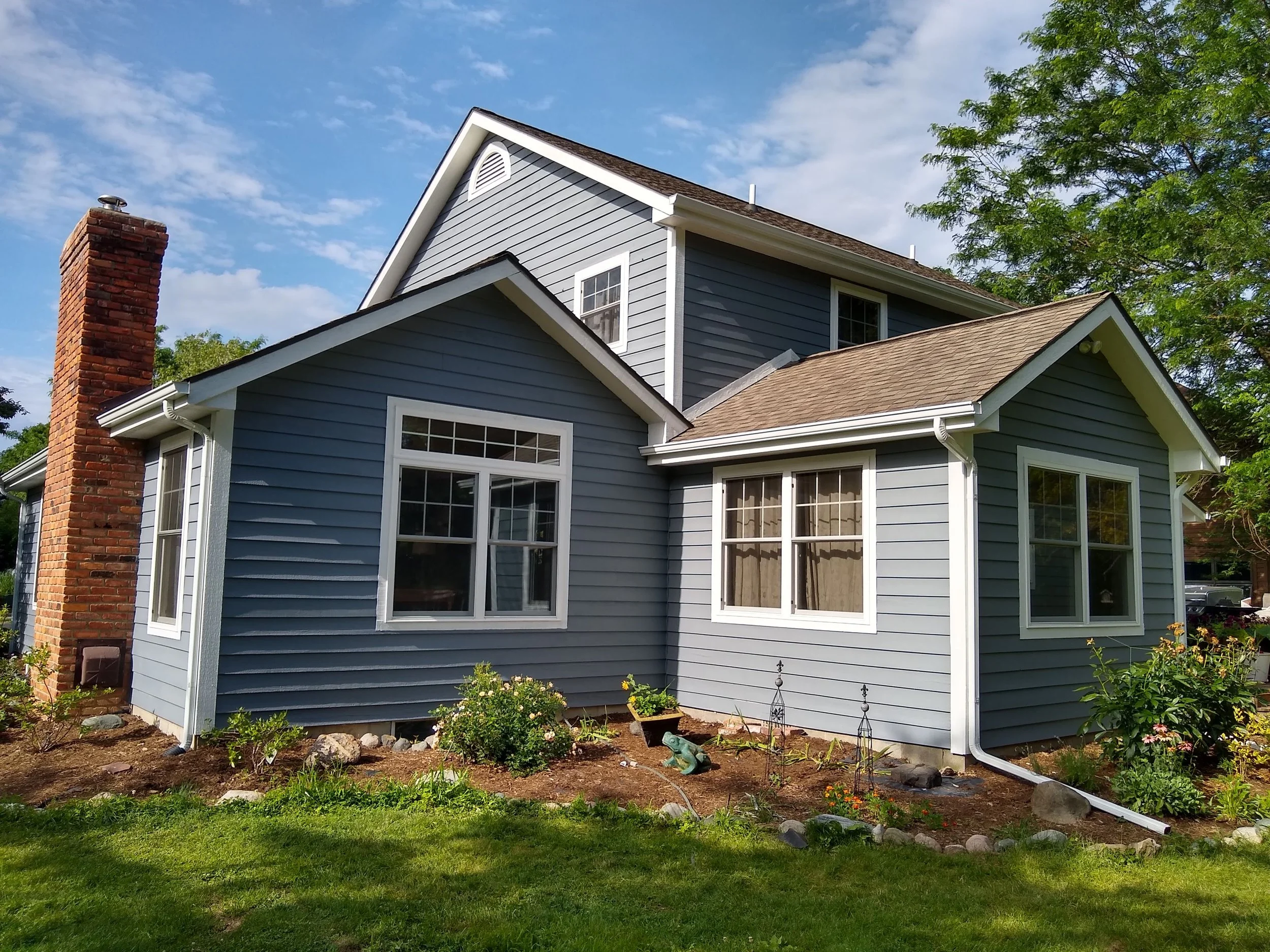 New Siding, Windows, Paint, and Trim