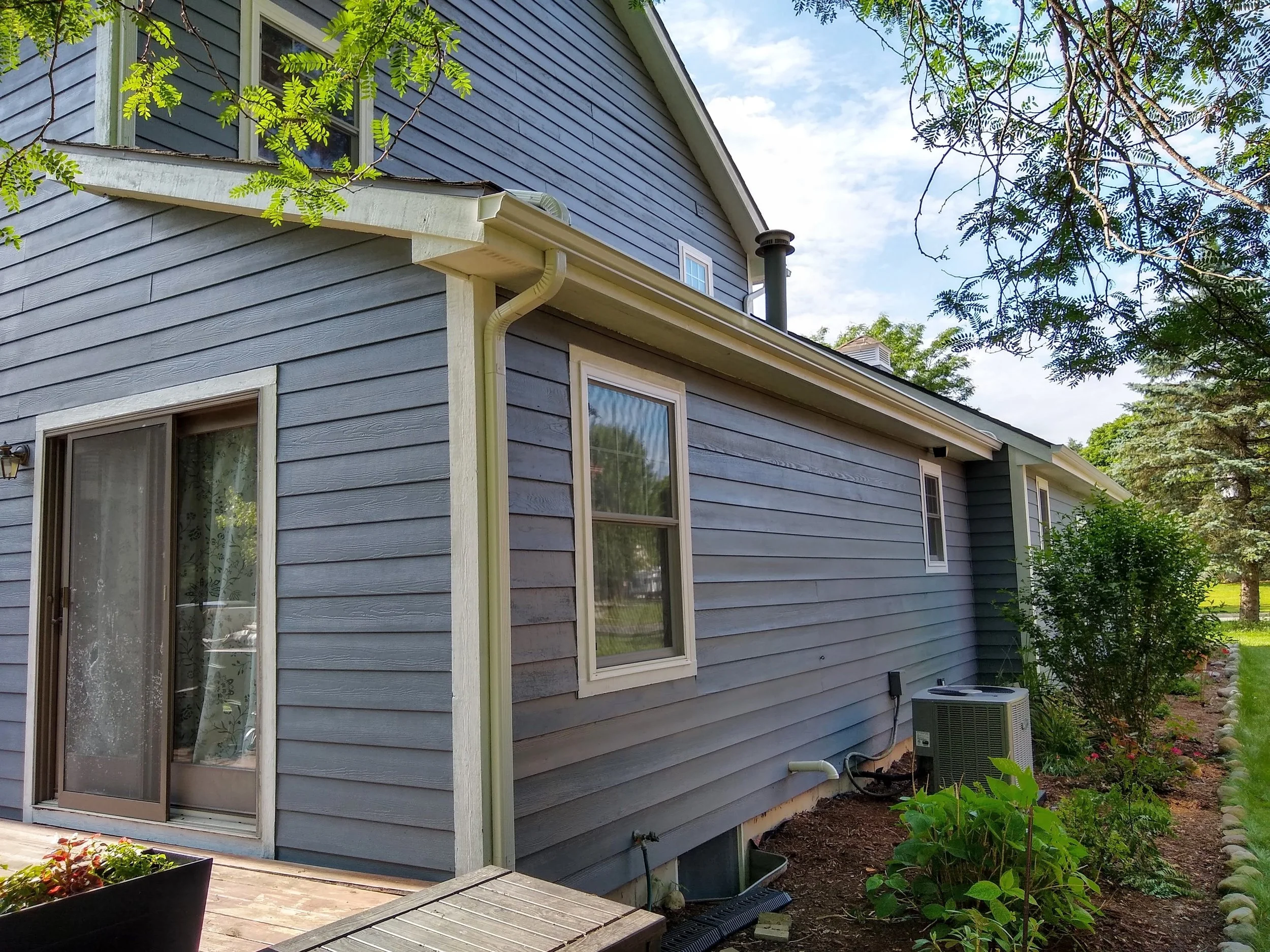 New Siding, Windows, Paint, and Trim
