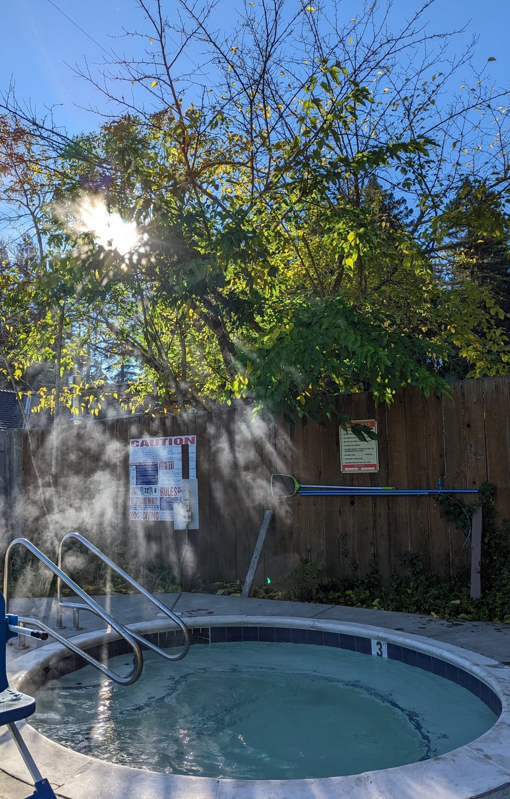 Outdoor hot tub in morning steam