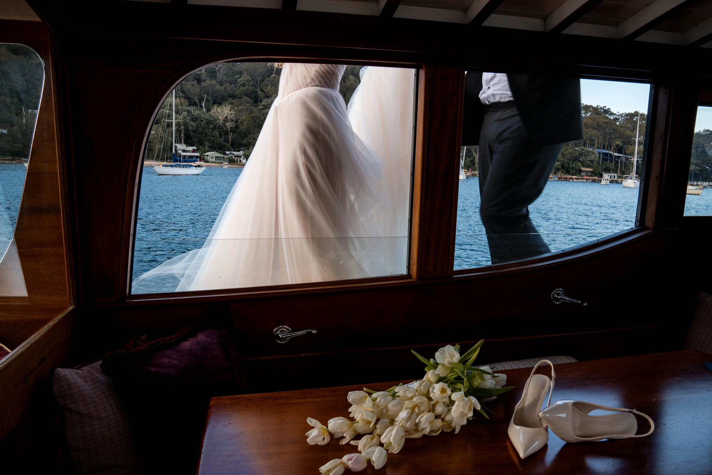 Chelsea and Jack celebrating their wedding at Pasadena, one of Sydney’s beautiful waterfront wedding venues on Pittwater.