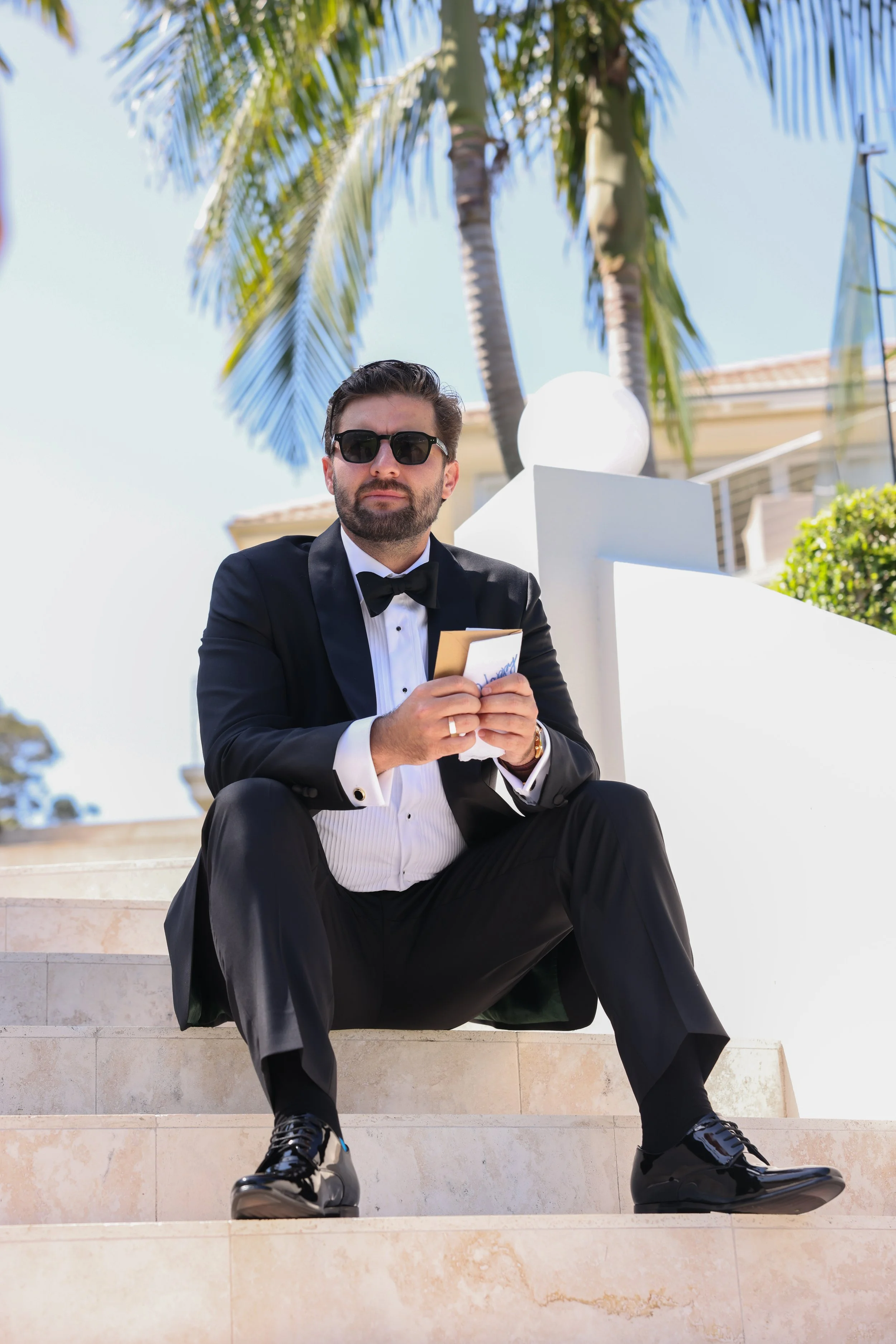 Relaxed groom preparations at a family property in Newport, capturing the candid moments before Chelsea and Jack’s Sydney wedding.