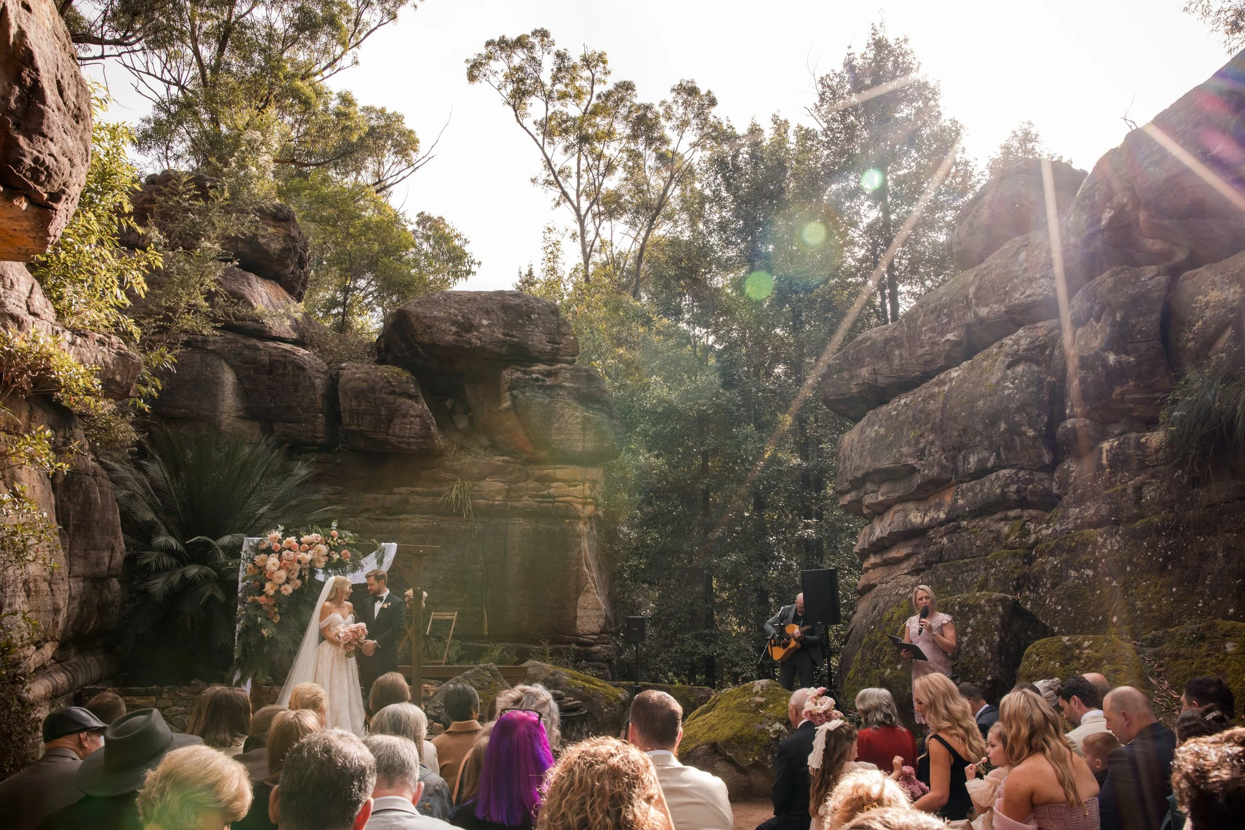 Hannah and Rohan’s three-day Kangaroo Valley wedding at Kangaroo Valley Bush Retreat, featuring an intimate ceremony at the iconic Rock Cathedral. A beautiful Southern Highlands wedding celebration surrounded by family, friends and the Australian bus