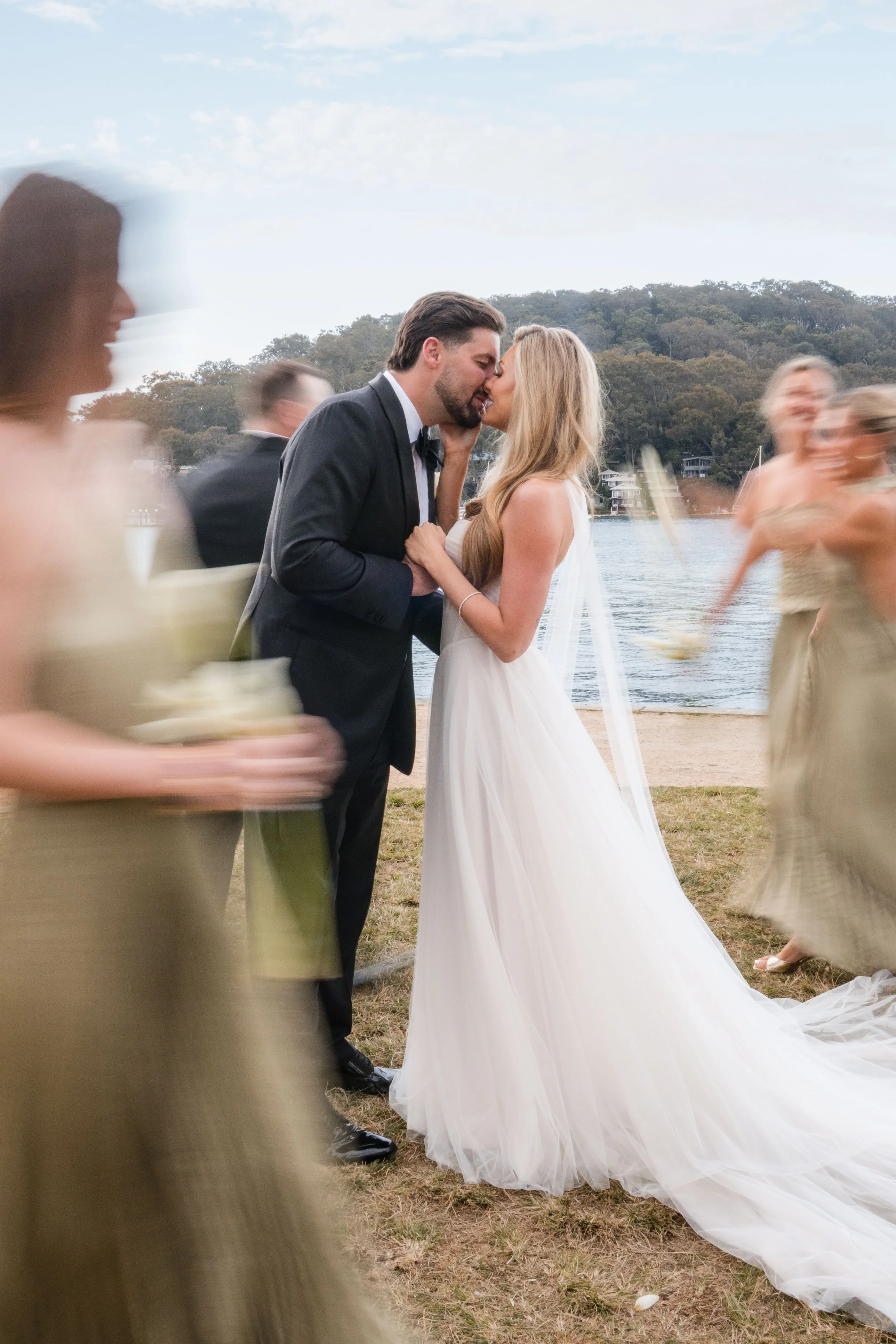 Chelsea and Jack celebrating their wedding at Pasadena, one of Sydney’s beautiful waterfront wedding venues on Pittwater.