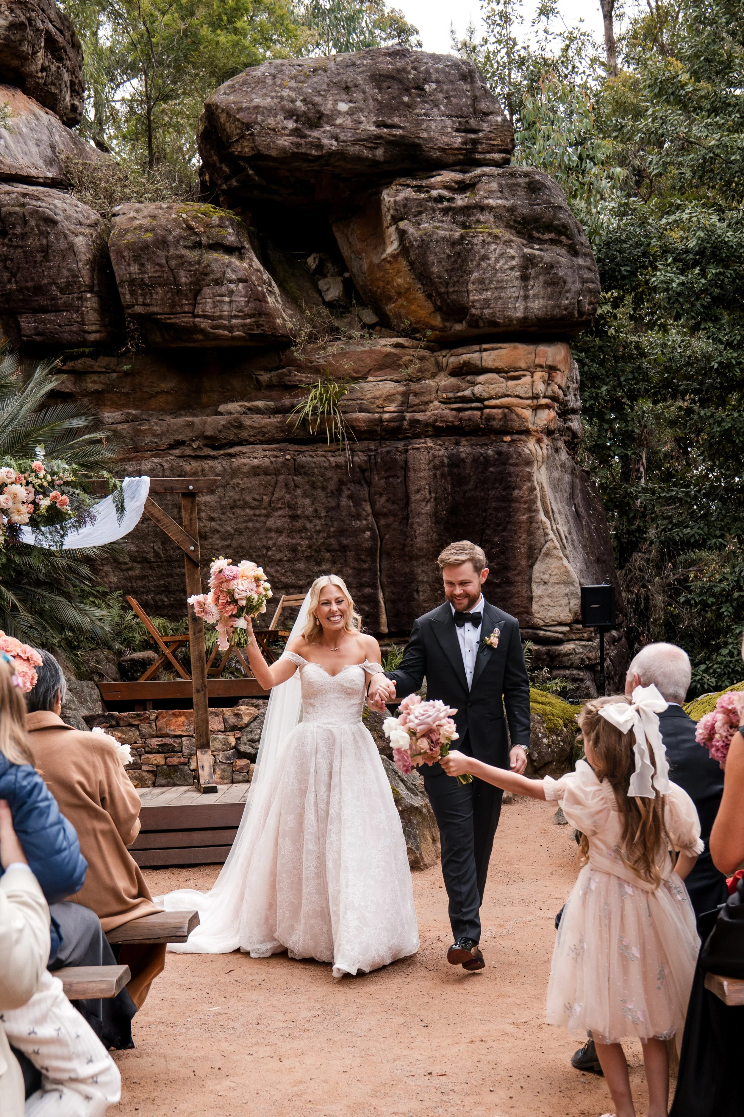 Hannah and Rohan’s three-day Kangaroo Valley wedding at Kangaroo Valley Bush Retreat, featuring an intimate ceremony at the iconic Rock Cathedral. A beautiful Southern Highlands wedding celebration surrounded by family, friends and the Australian bus