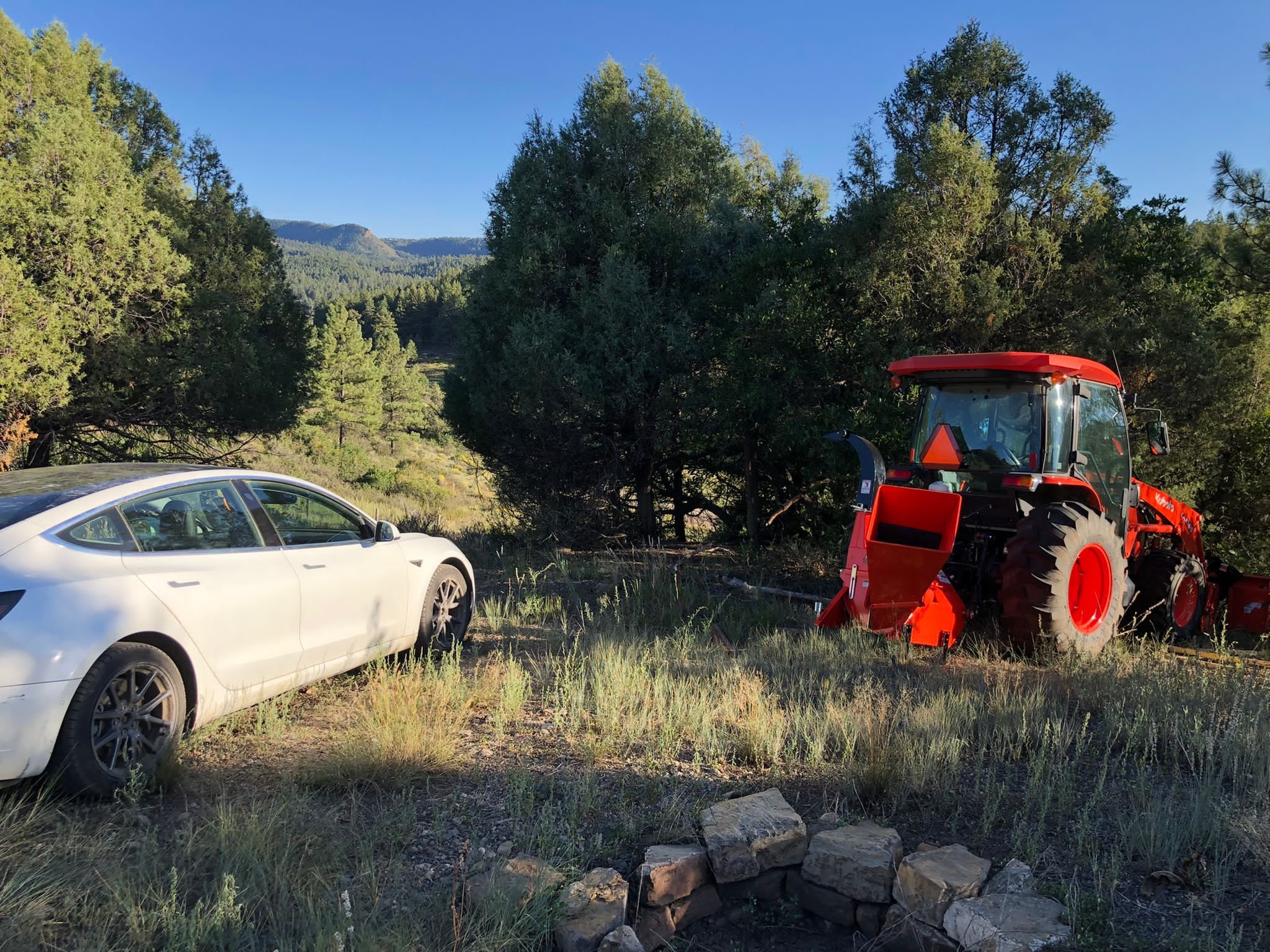tesla and tractor.jpg