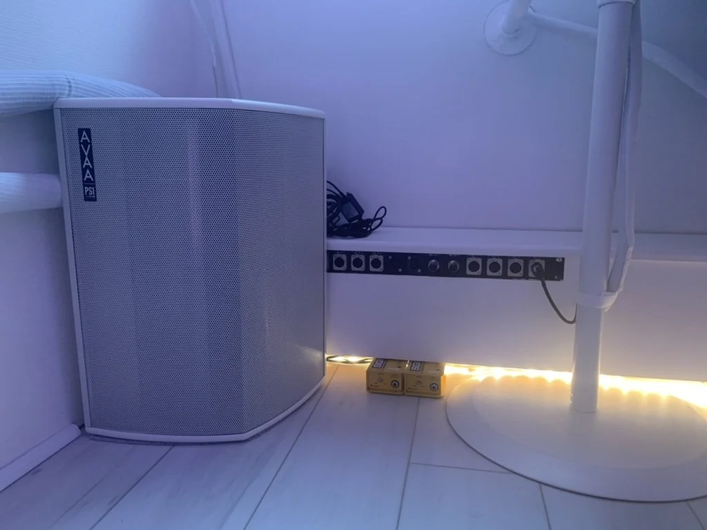 1 of 4 AVAA C20 absorbers, alongside a custom patch panel and two Radial SGI guitar/bass extenders