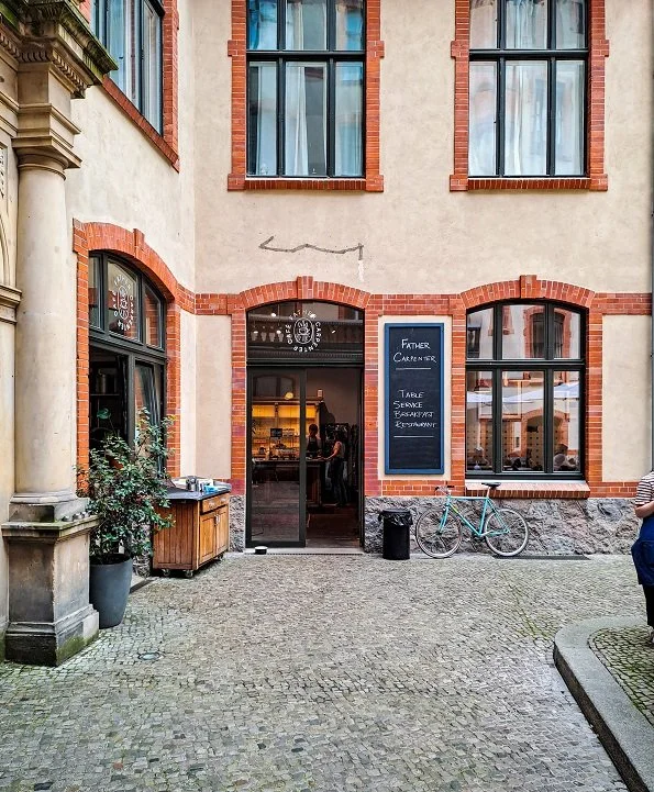 Father Carpenter Berlin Cafe.jpg