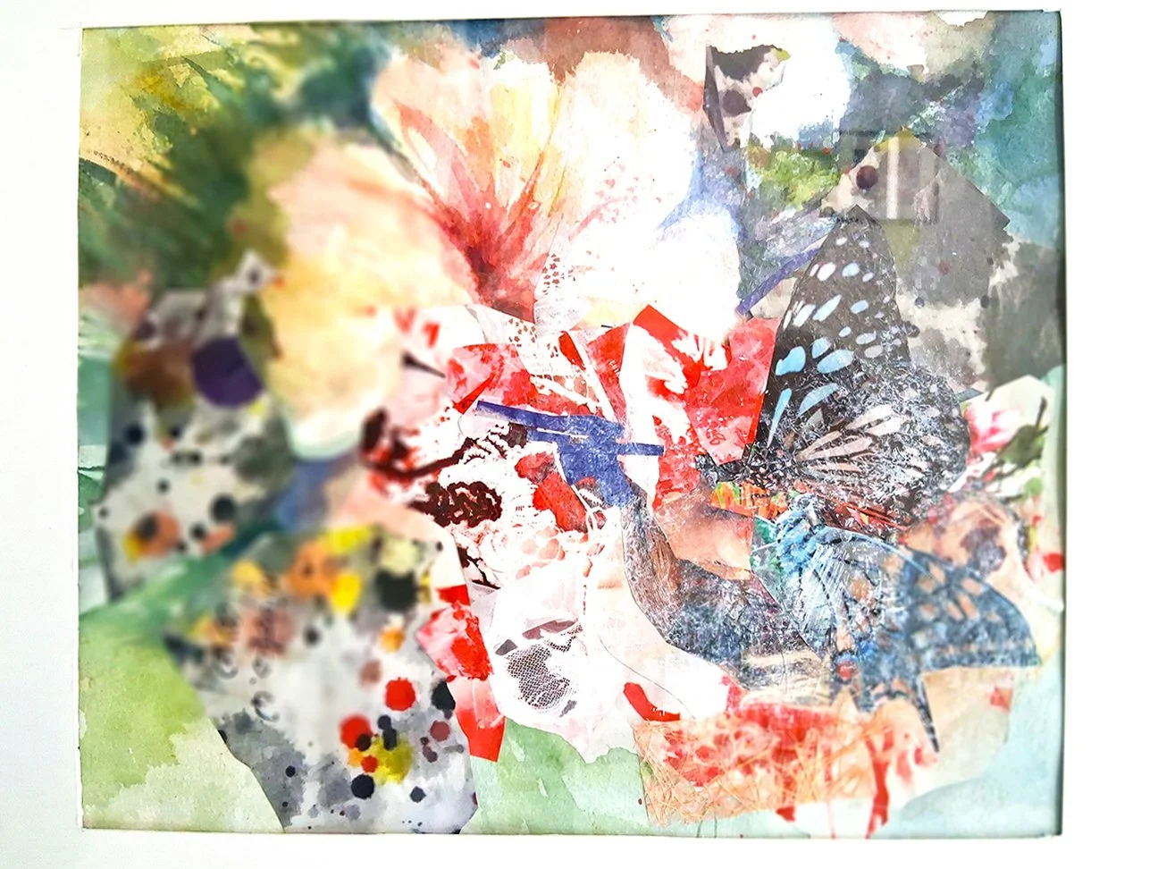 A colorful collage of butterflies and flowers created with various watercolor and paper cutout techniques.