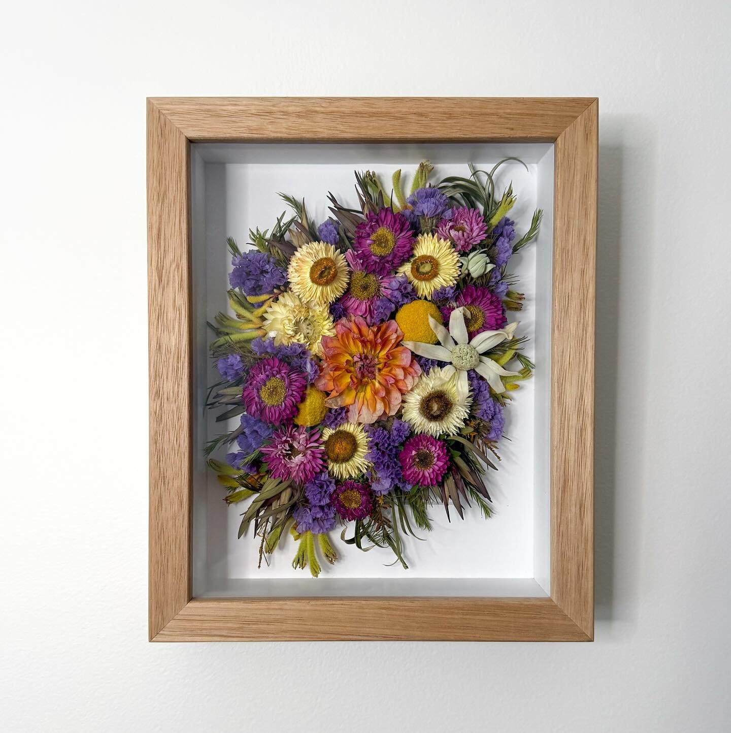 What once brightened Amy&rsquo;s wedding tables, now lives on as timeless art &mdash; her colourful posy jars, framed in The Petite - Traditional oak frame 🌼
Swipe to see the before ➡️

Bookings/ more info via florpetalflorist.com (link in bio) 

#p