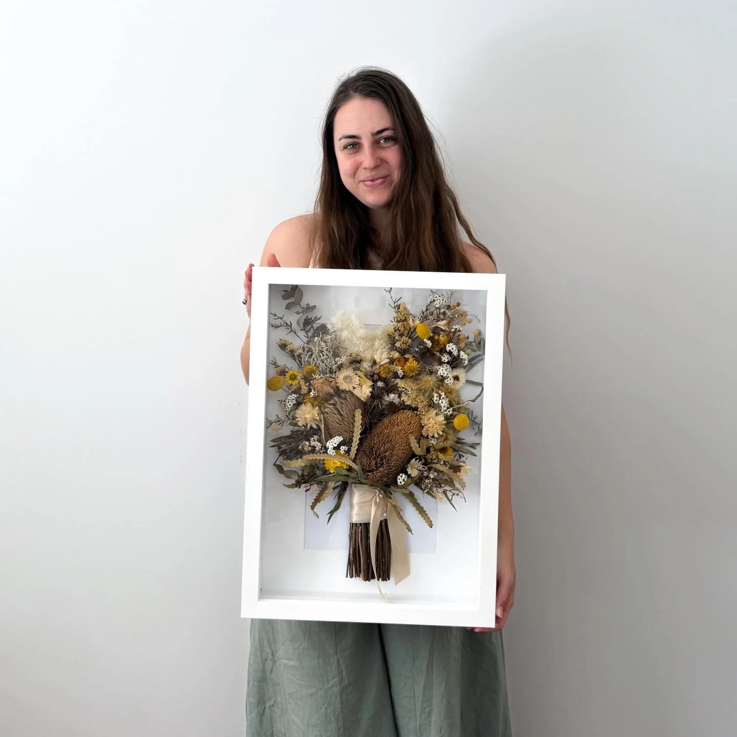 Happy new year! This one&rsquo;s a special one 🤍💛
A few years ago, I had the honour of creating Brooke + James&rsquo; wedding bouquet - a beautiful boho mix of white and yellow dried blooms. Recently, Brooke reached out to have her bouquet designed