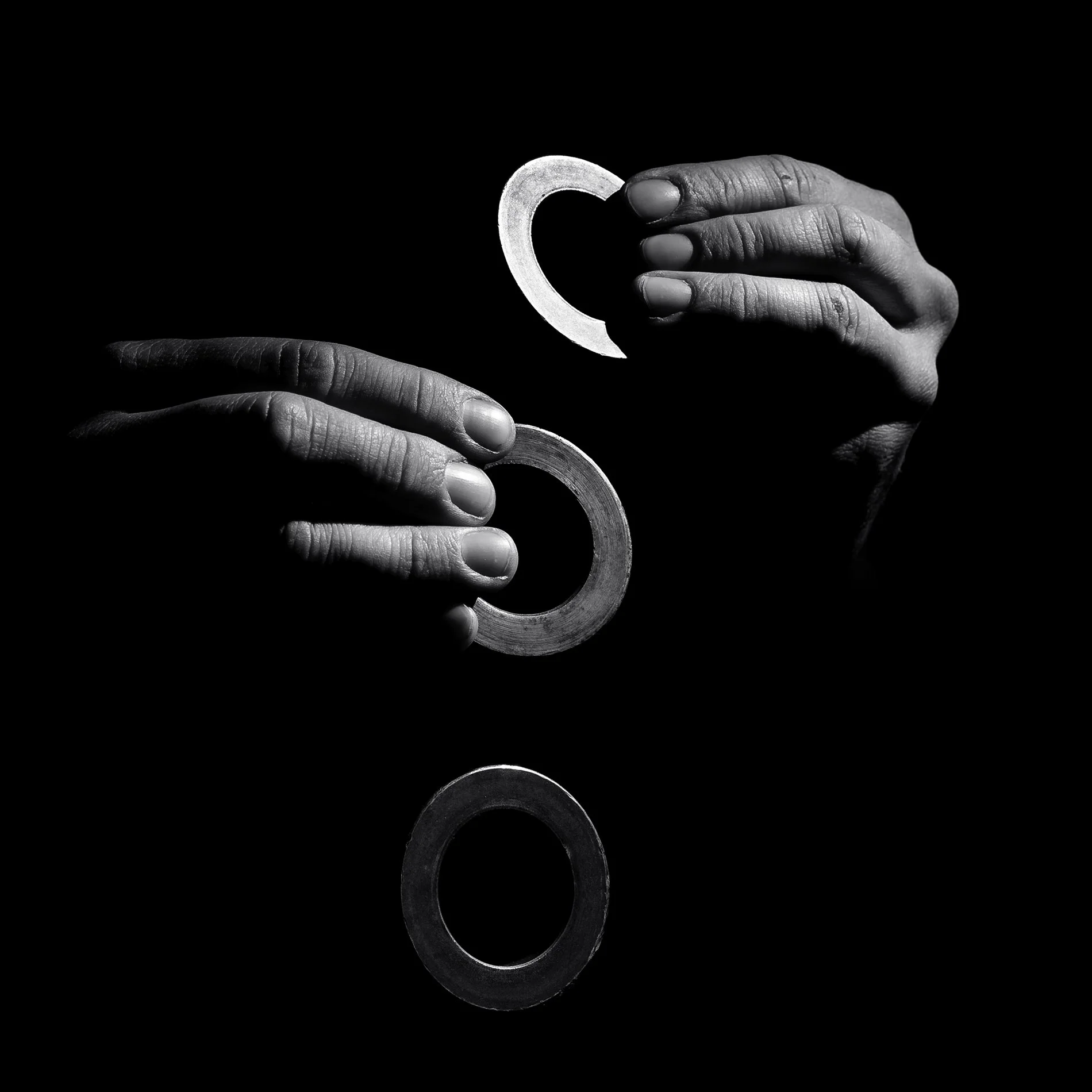 two hands threewashers.jpg