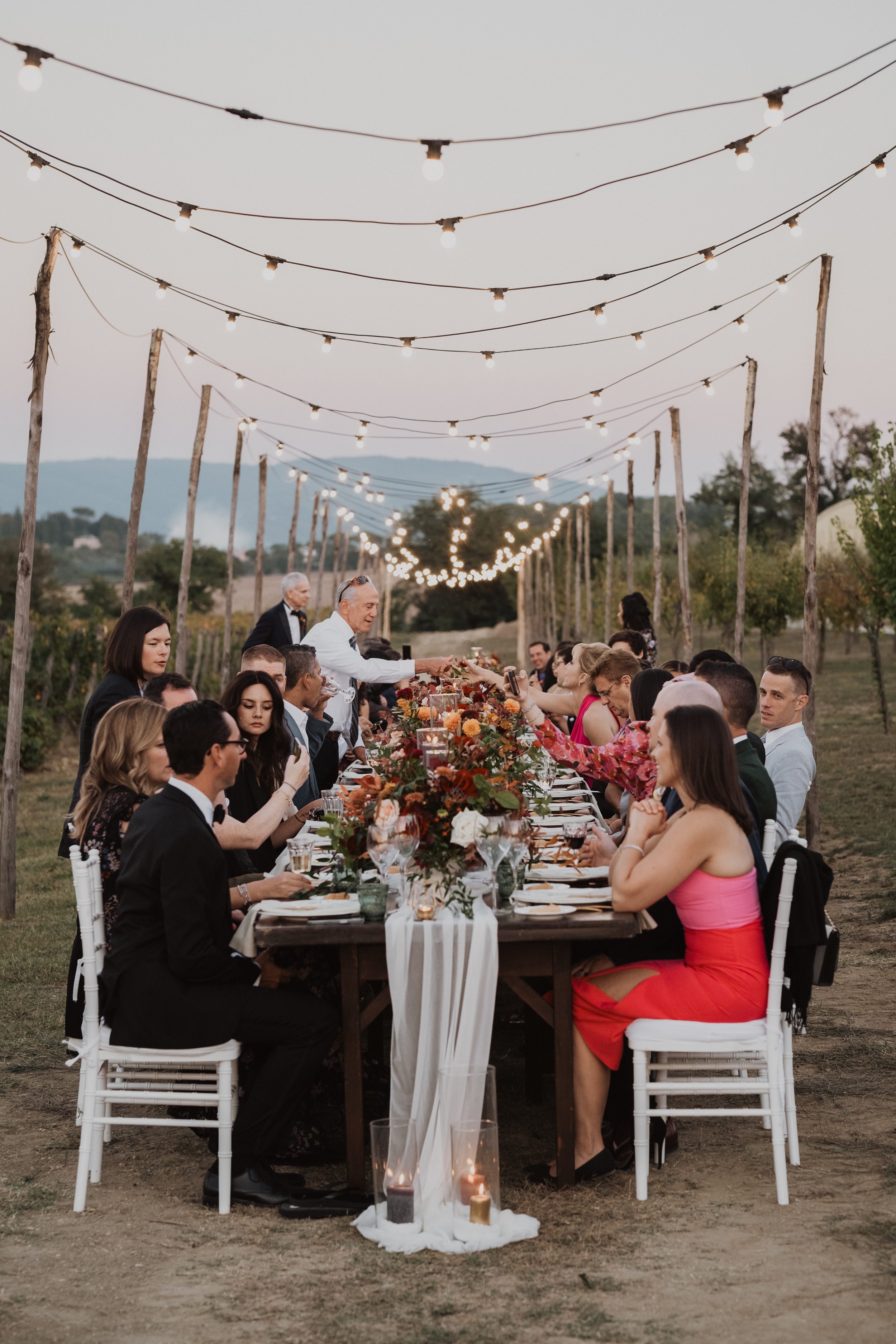 Elegant Vineyard Wedding Reception Under String Lights a Tenuta dei Mori | Intimate Destination Wedding Photography