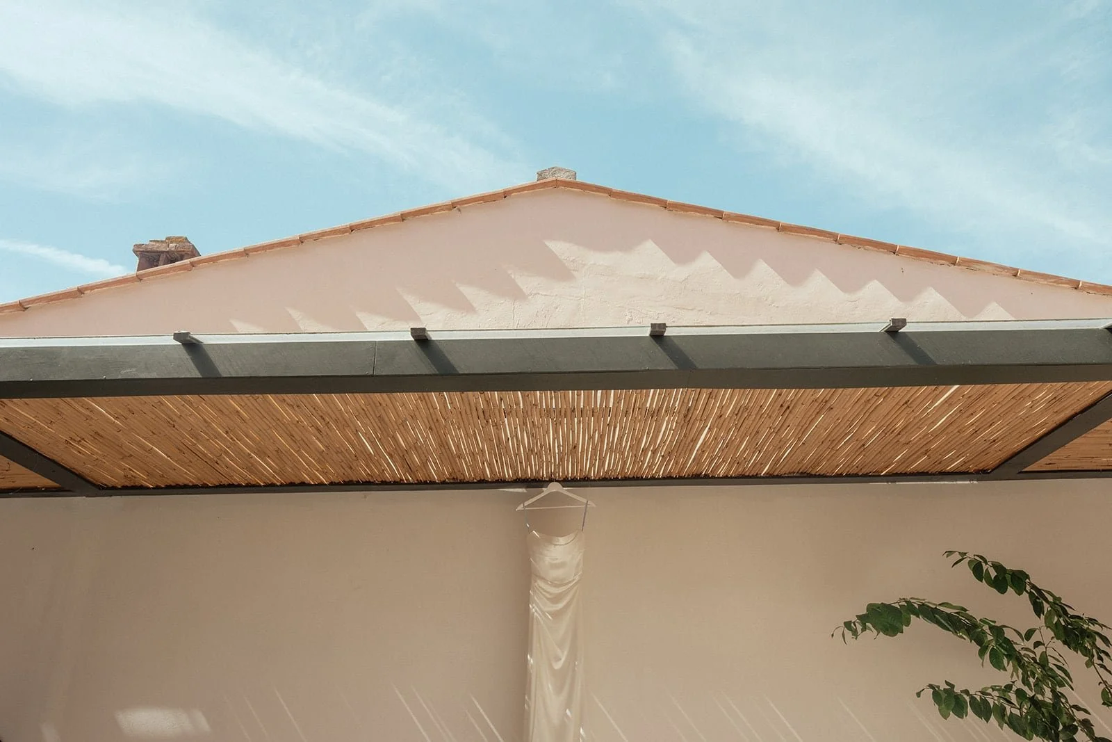 Clean architectural lines and summer shadows at Villa Lena, photographed just before an intimate Tuscan wedding celebration.