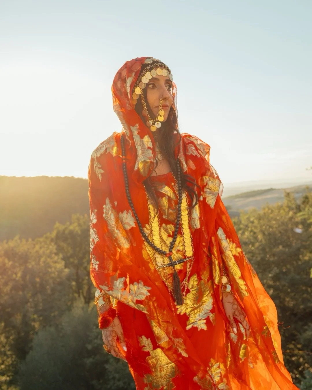 Two worlds, held close &bull;

Sudanese traditions, a Western ceremony, and the last light of a Tuscan summer.
Red and gold under the Tuscan sun. White beneath the cypresses.
And the particular privilege of photographing a (very talented) photographe
