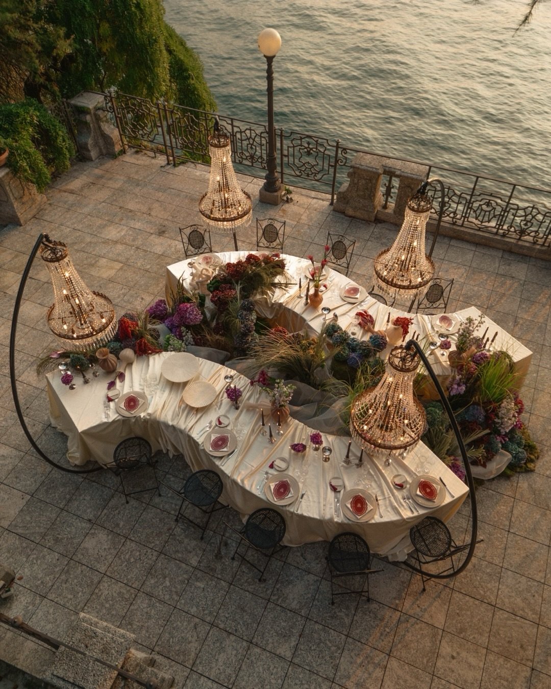 Somewhere on Lake Como, an intimate table set for a few.

Beautiful silks, flowers spilling over the edges, and your favourite people gathered around it.

An evening to remember by the lake.

- Photography: @close_enough_photography 
- Planner: @dali