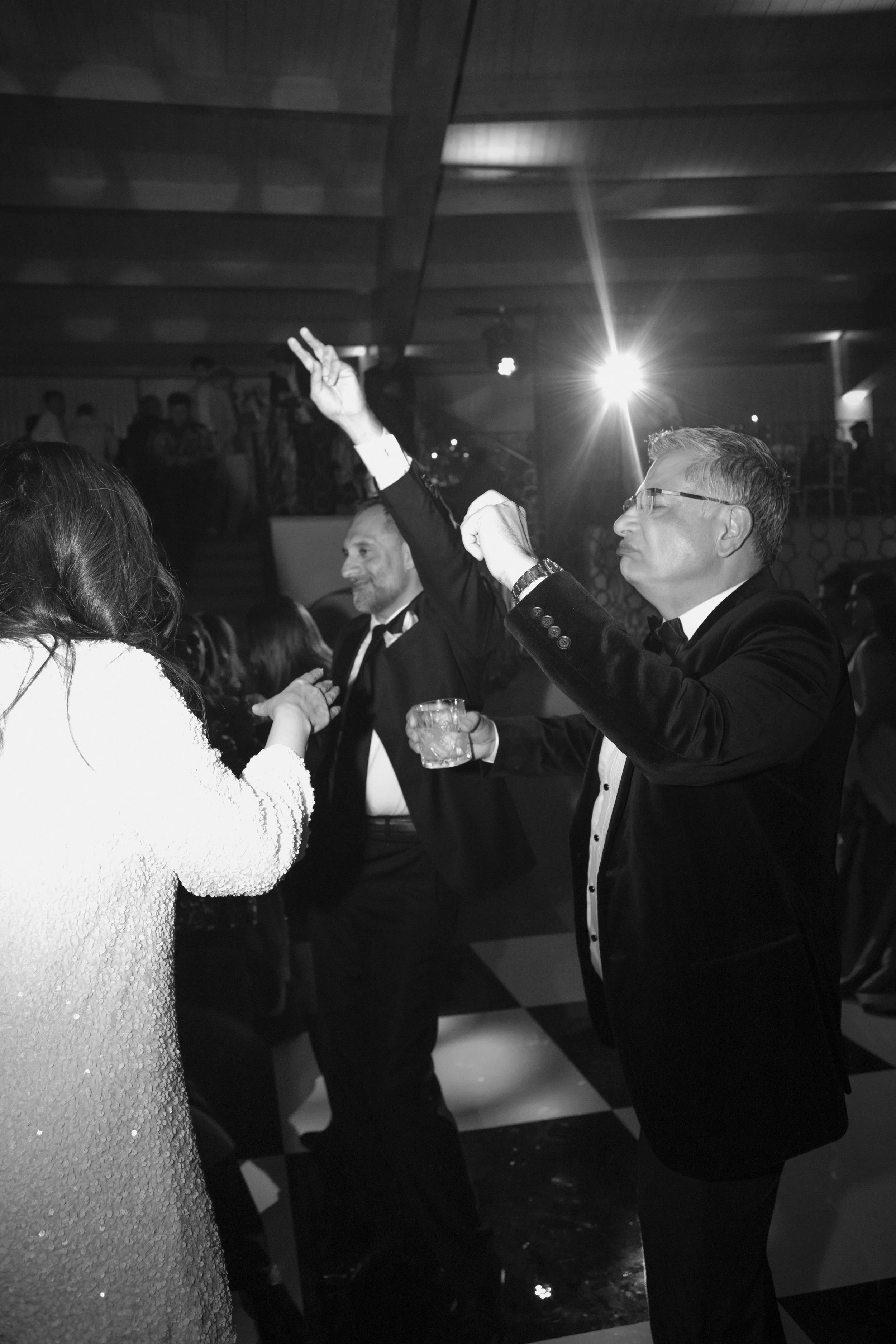 aashna-sahil-luxury-indian-wedding-il-borro-tuscany-guests-dancing-black-tie-celebration.jpg