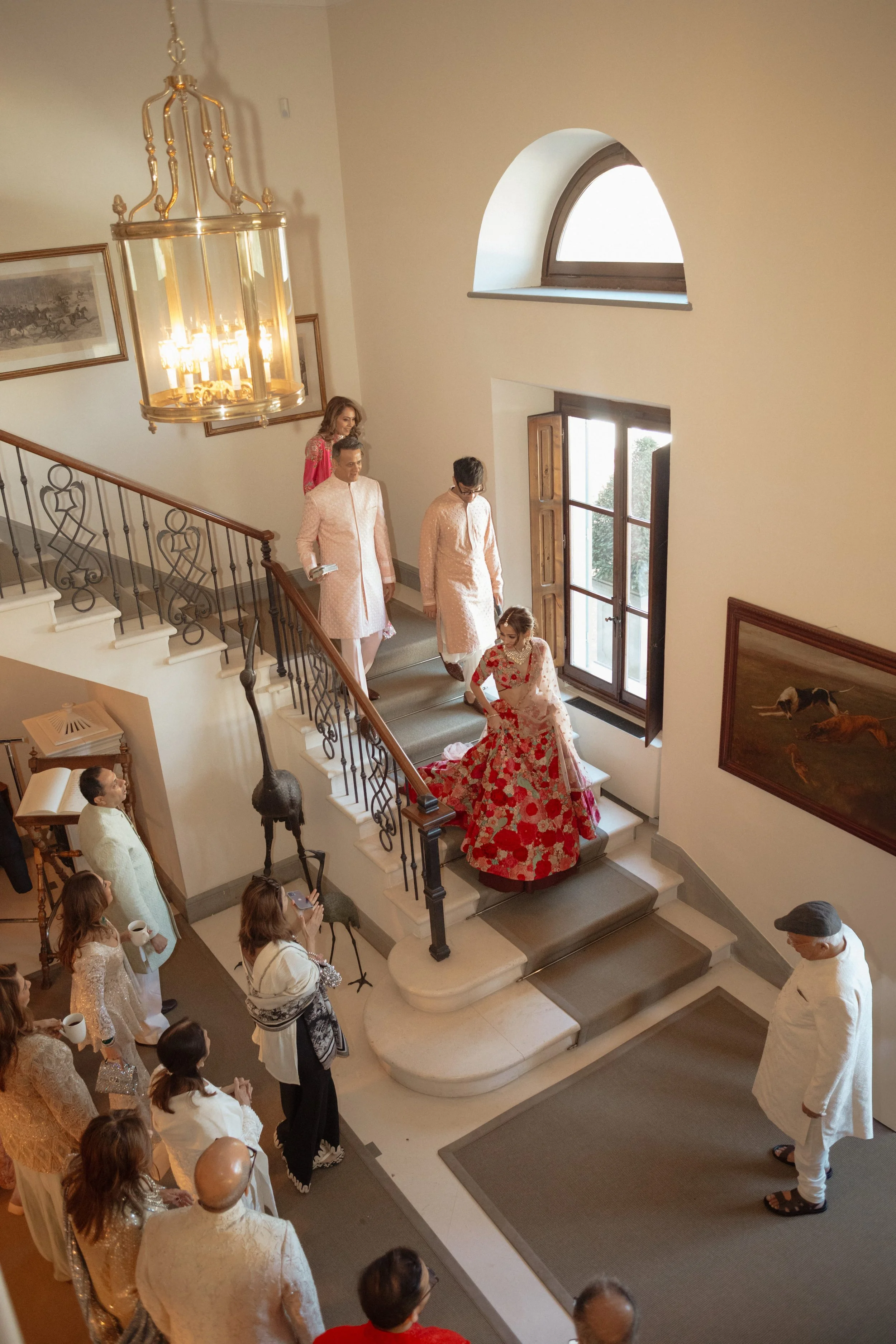 luxury-indian-wedding-il-borro-tuscany-bride-walking-with-family-pre-ceremony.jpg