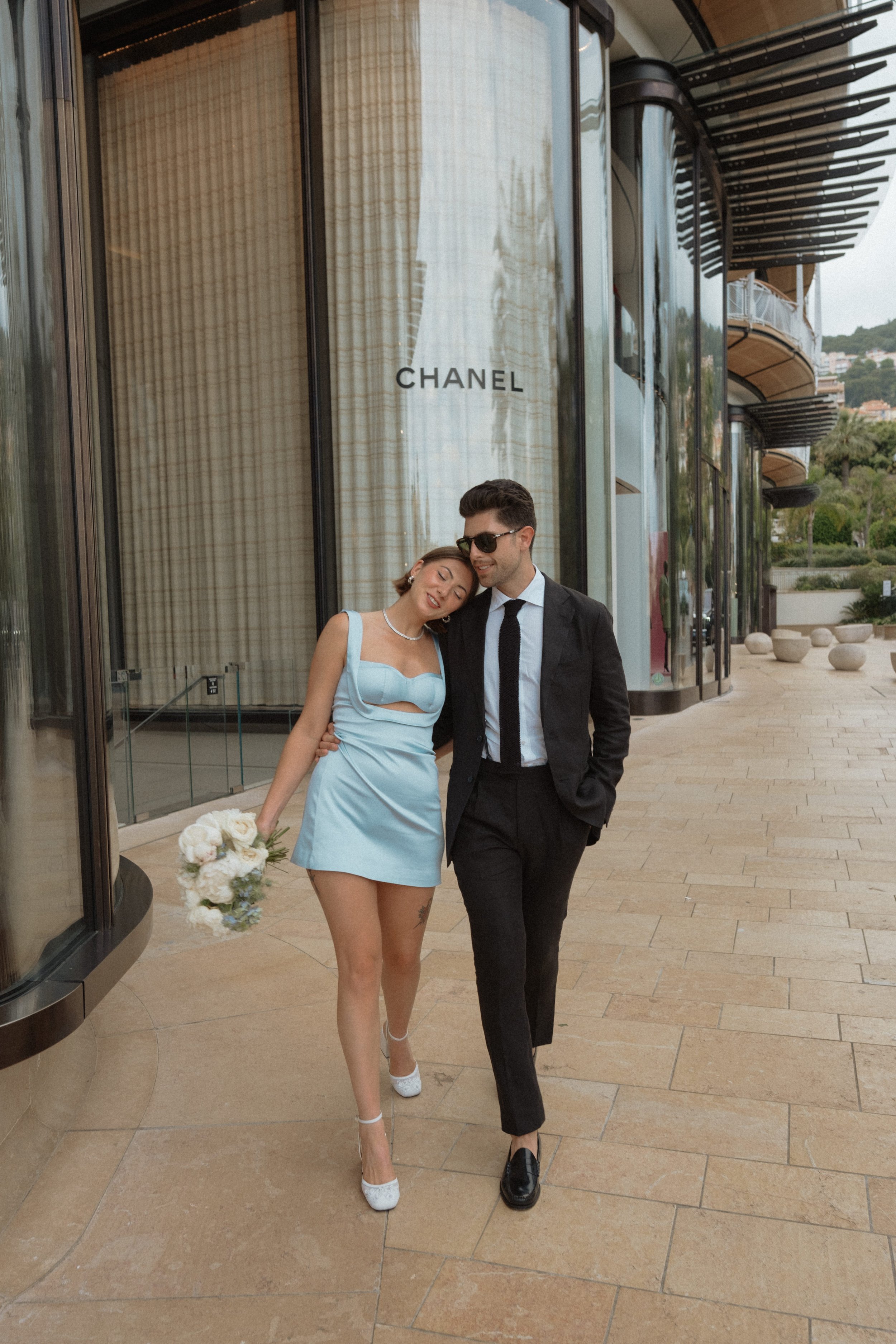 Chic Couple in Front of Chanel Store | Luxury Destination Wedding Photography