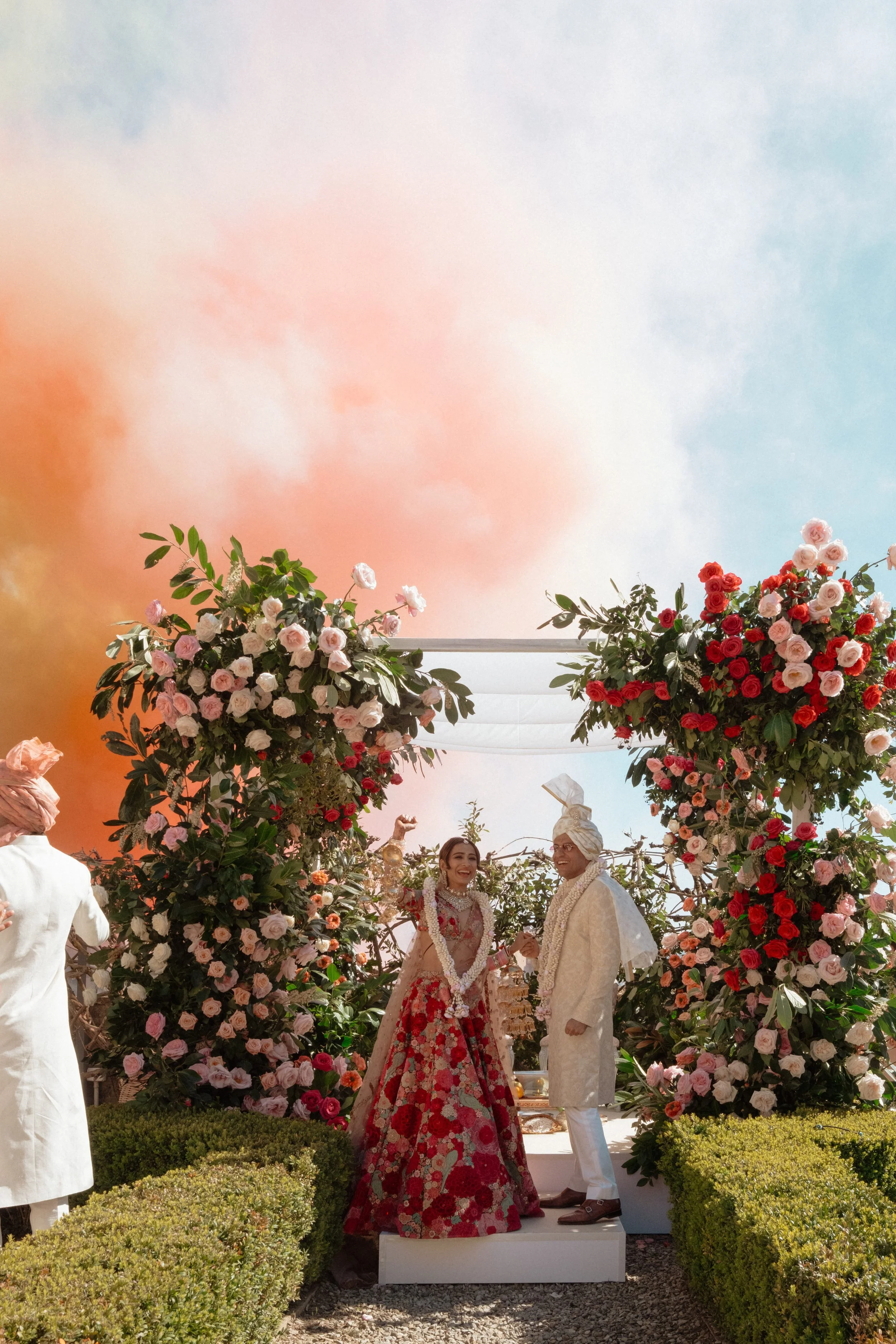 sahil-aashna-luxury-indian-wedding-il-borro-tuscany-exchanging-varmala-garlands.jpg