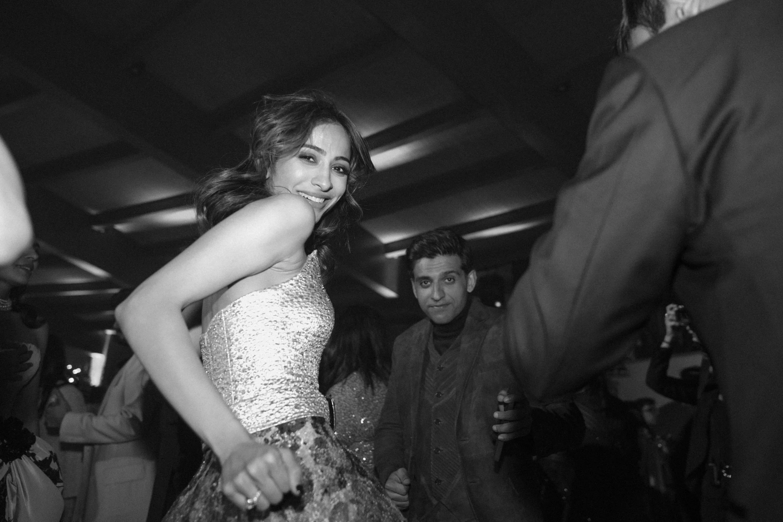 aashna-sahil-luxury-indian-wedding-il-borro-tuscany-bride-dancing-sangeet-celebration.jpg