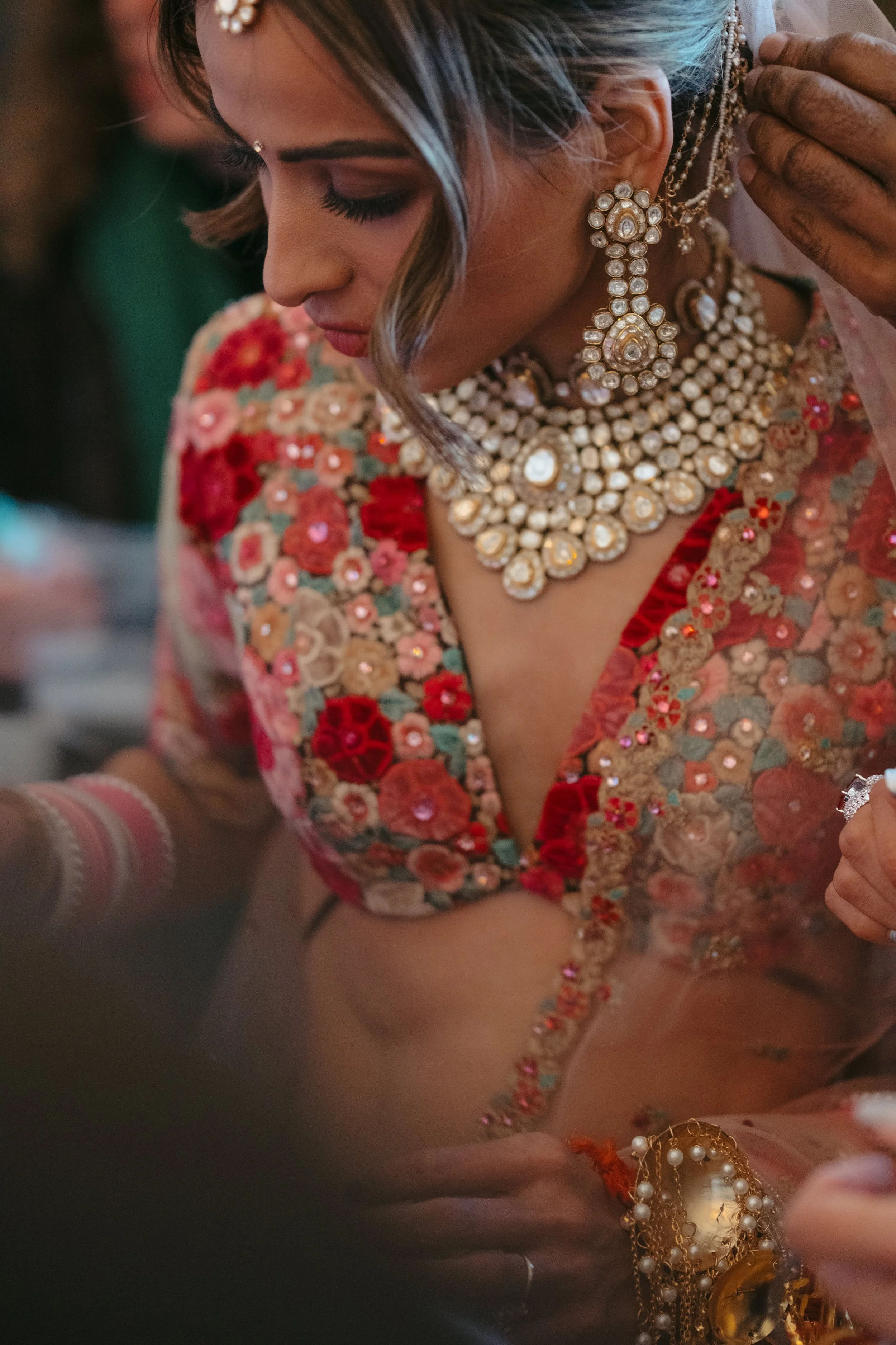Close-up of intricate Indian bridal jewellery during an elegant destination wedding in Italy, blending heritage craftsmanship with refined luxury.