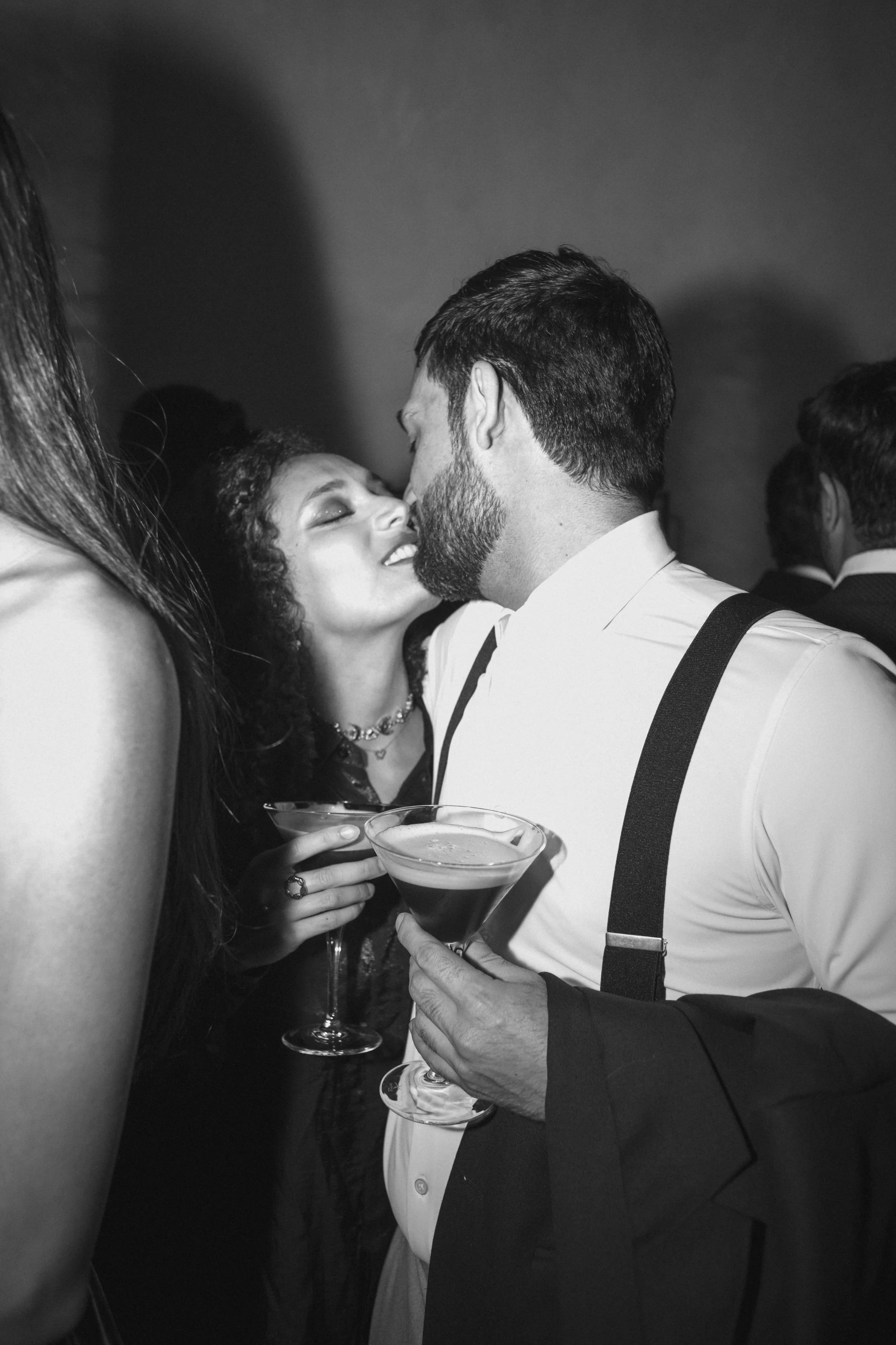 Toast with Martinis During Wedding Party at Il Borro.jpg