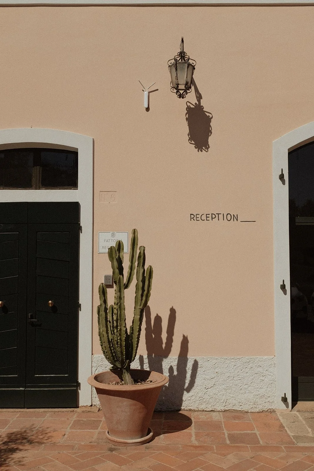 Minimal architectural details at Villa Lena in Tuscany, captured in warm summer light before an intimate destination wedding.