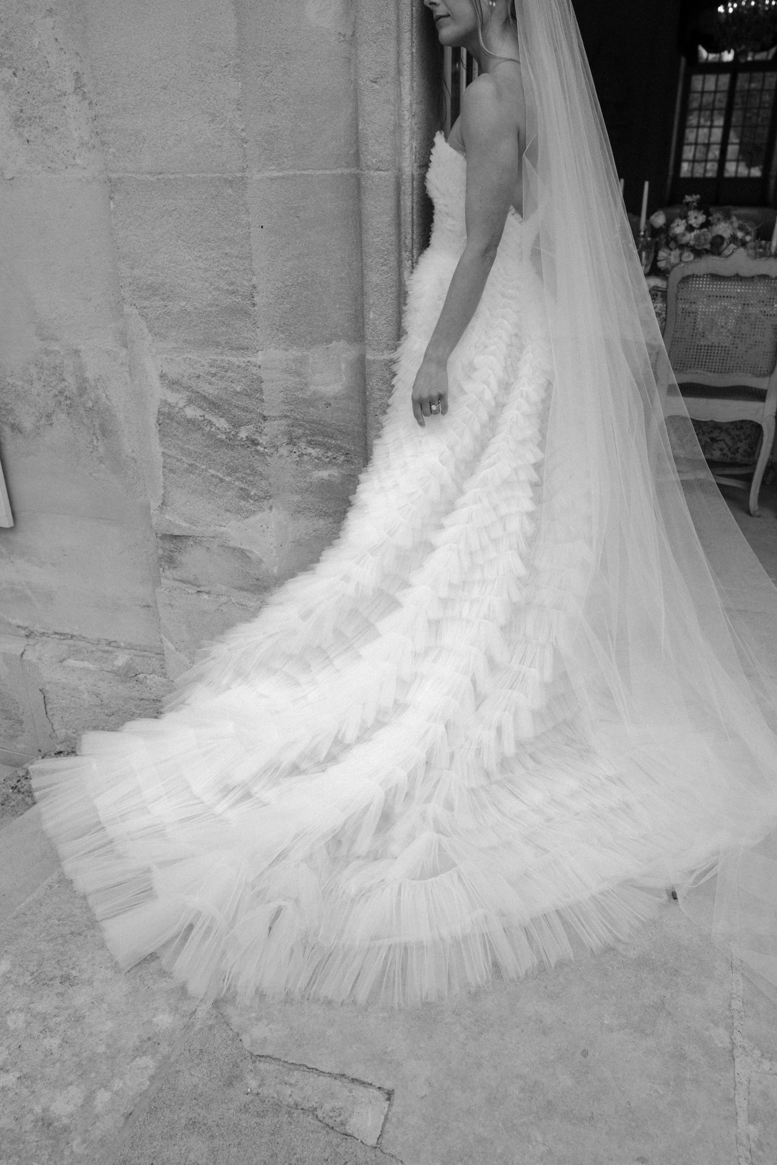 A sculptural bridal gown detail photographed in Florence, highlighting texture, movement, and refined elegance through a fashion-inspired lens.