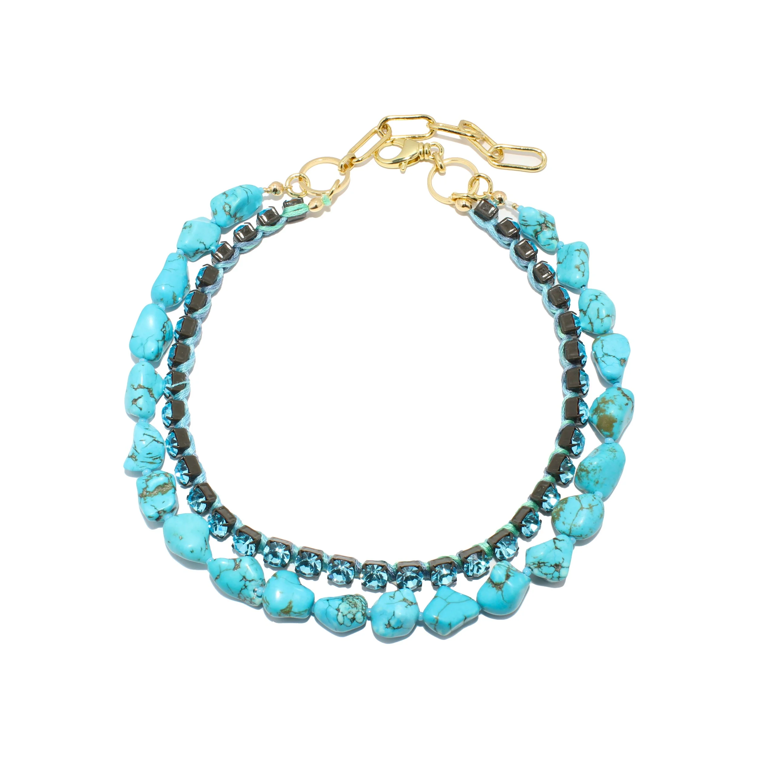 Turquoise and black stone beaded necklace with a gold chain and clasp.
