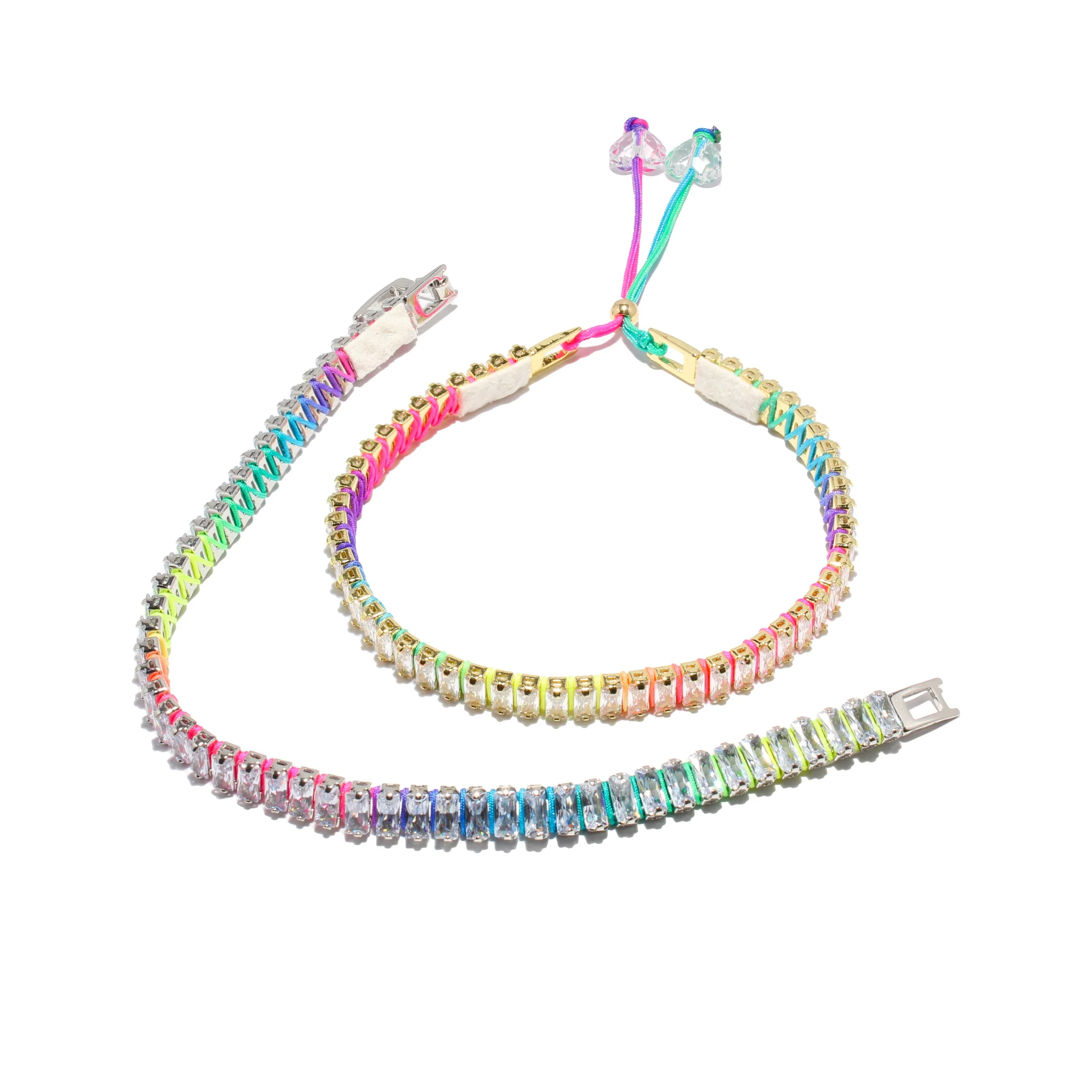 Set of three colorful rhinestone jewelry pieces including a bracelet, a choker, and a necklace with rainbow gradient design and iridescent closure