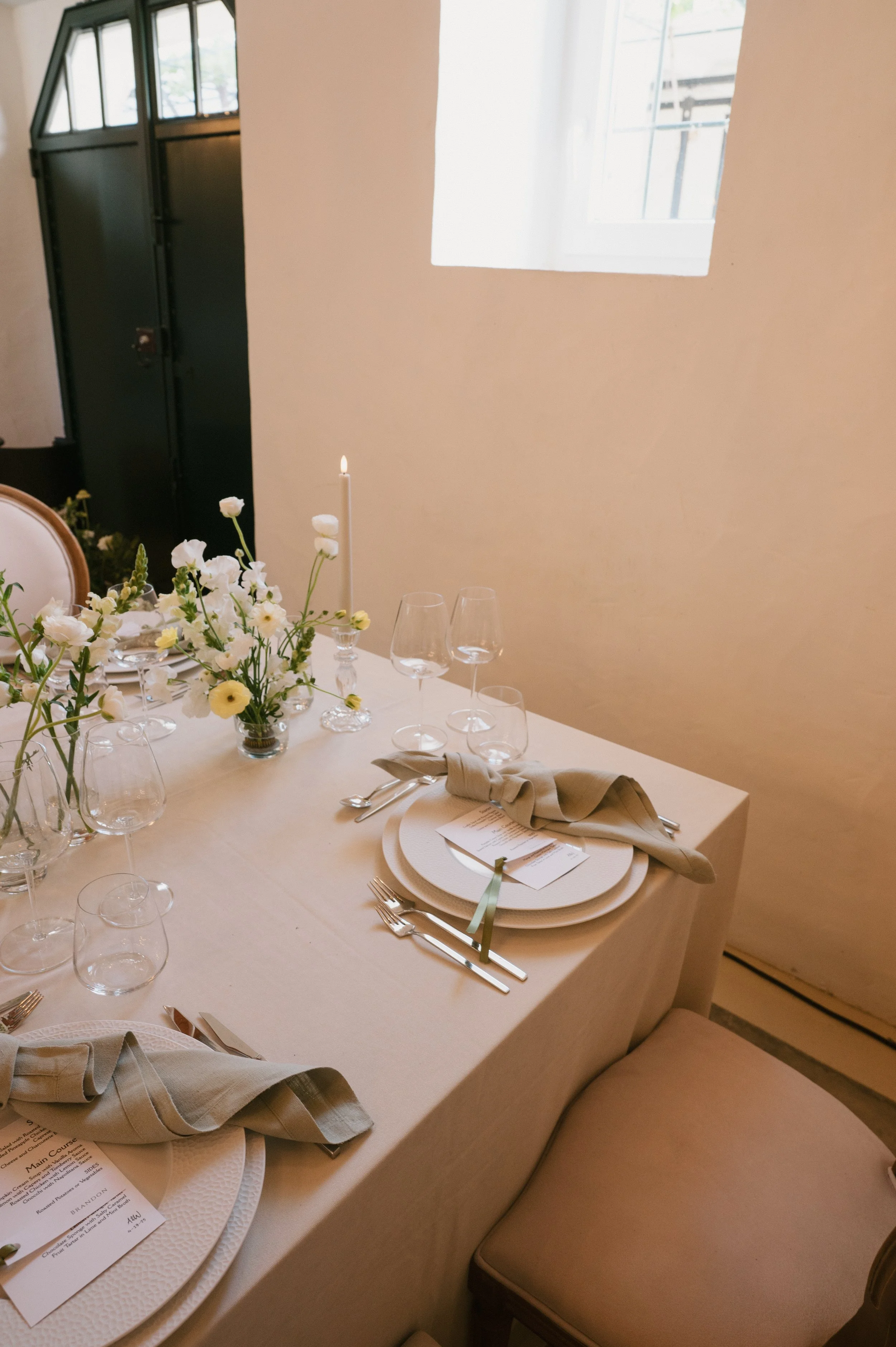Editorial style wedding reception with soft candle lighting in Europe