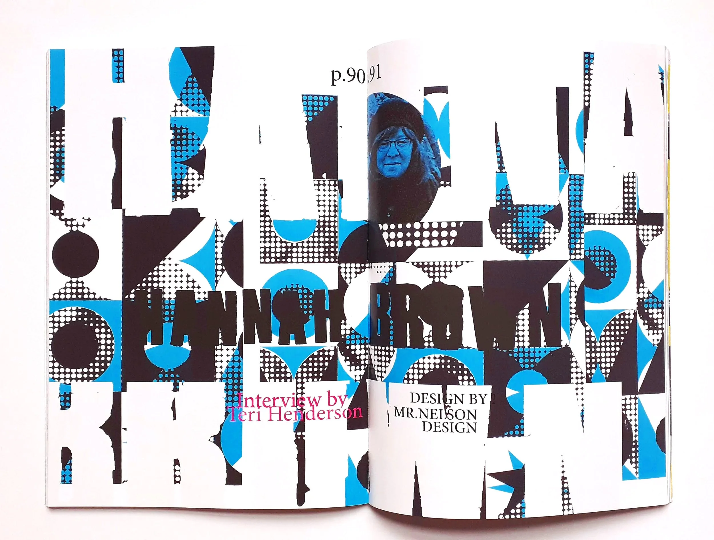 Open magazine with an abstract black, blue, and white pattern and a small photo of a person wearing glasses in the center. Text includes "Interview by Teri Henderson" and "Design by Mr. Nelson."