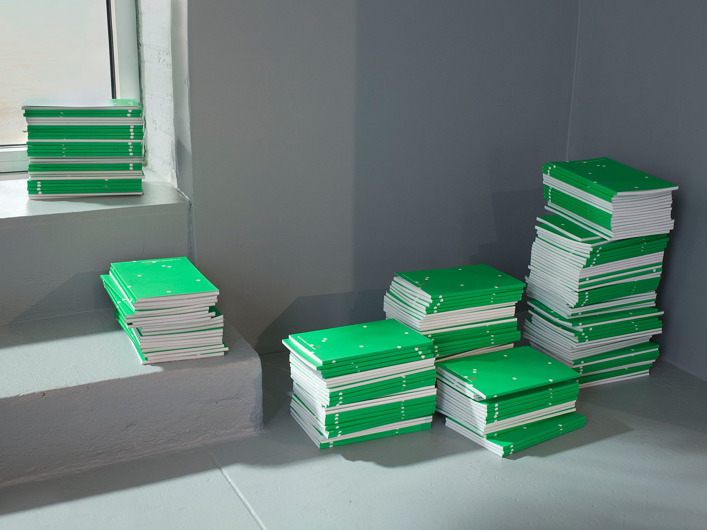  2 of 17   
 Happy Birthday  exhibition catalog for Christopher K. Ho, 2008. Stacks of catalogs as they appeared at the gallery opening.