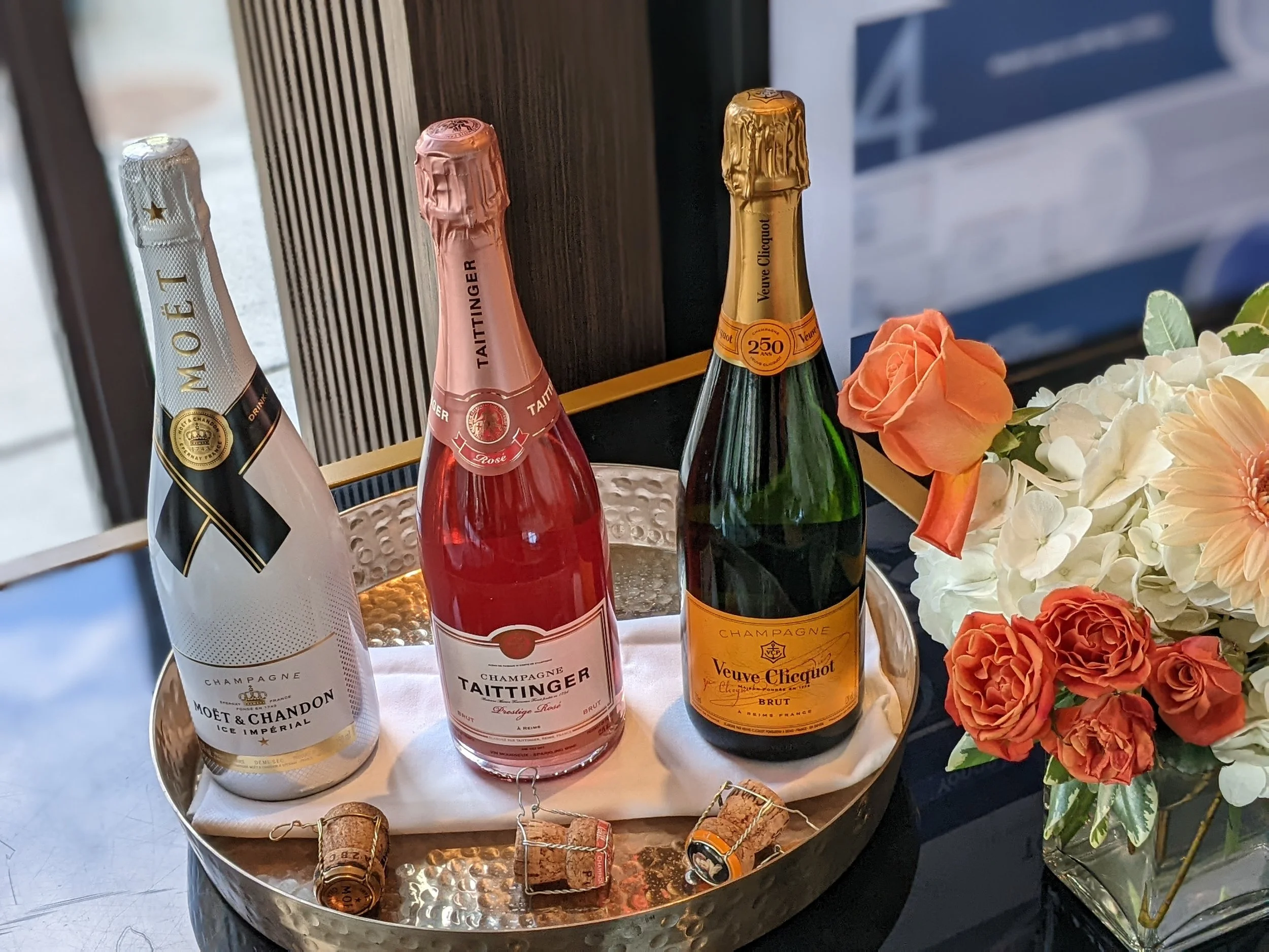 Taittinger, Veuve Cliquot and Moet Ice Imperial Champagnes on display for a corporate wine tasting in Toronto