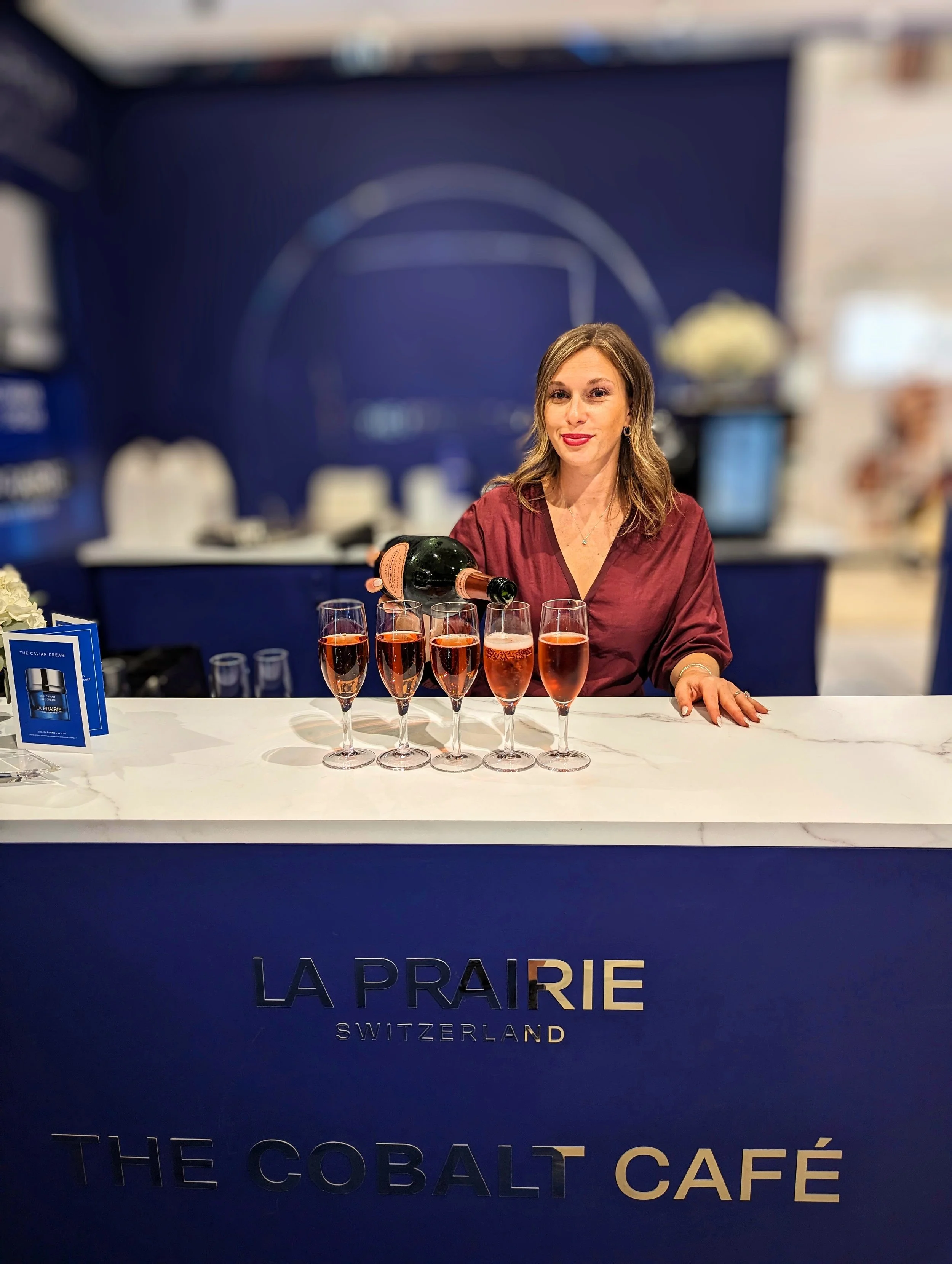 Sommelier pouring champagne at a corporate event