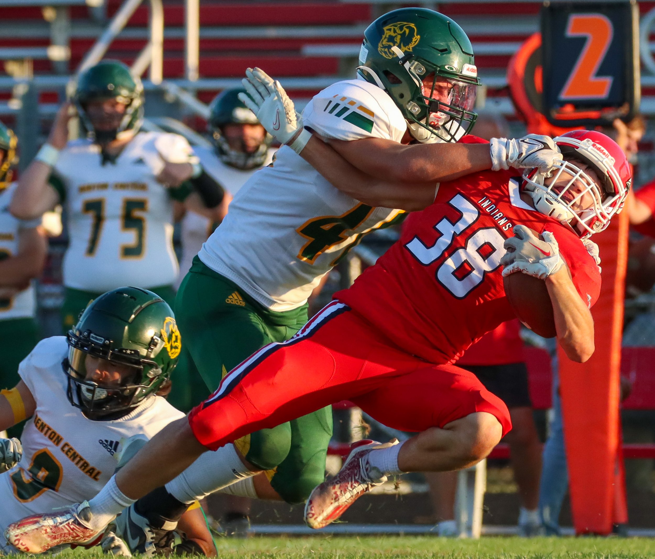 The Indian’s Colton Robertson (38) is brought down during the IHSAA football game against the Benton Central Bison, Friday, Sept. 15, 2023, at Twin Lakes High School in Monticello, Ind. Twin Lakes beat Benton Central, 41-14.