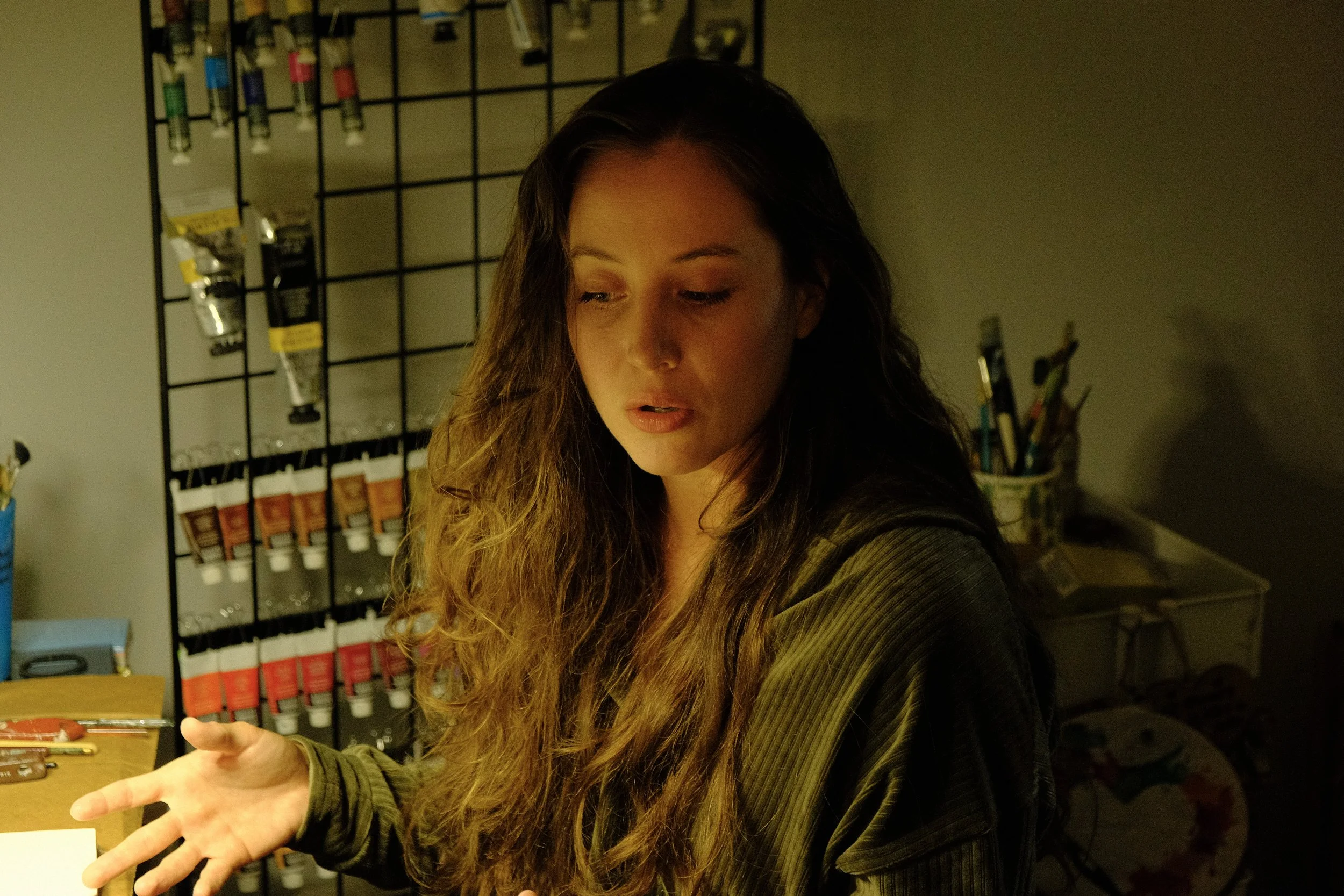 Carrie Lane talking in her first art studio in 2024.