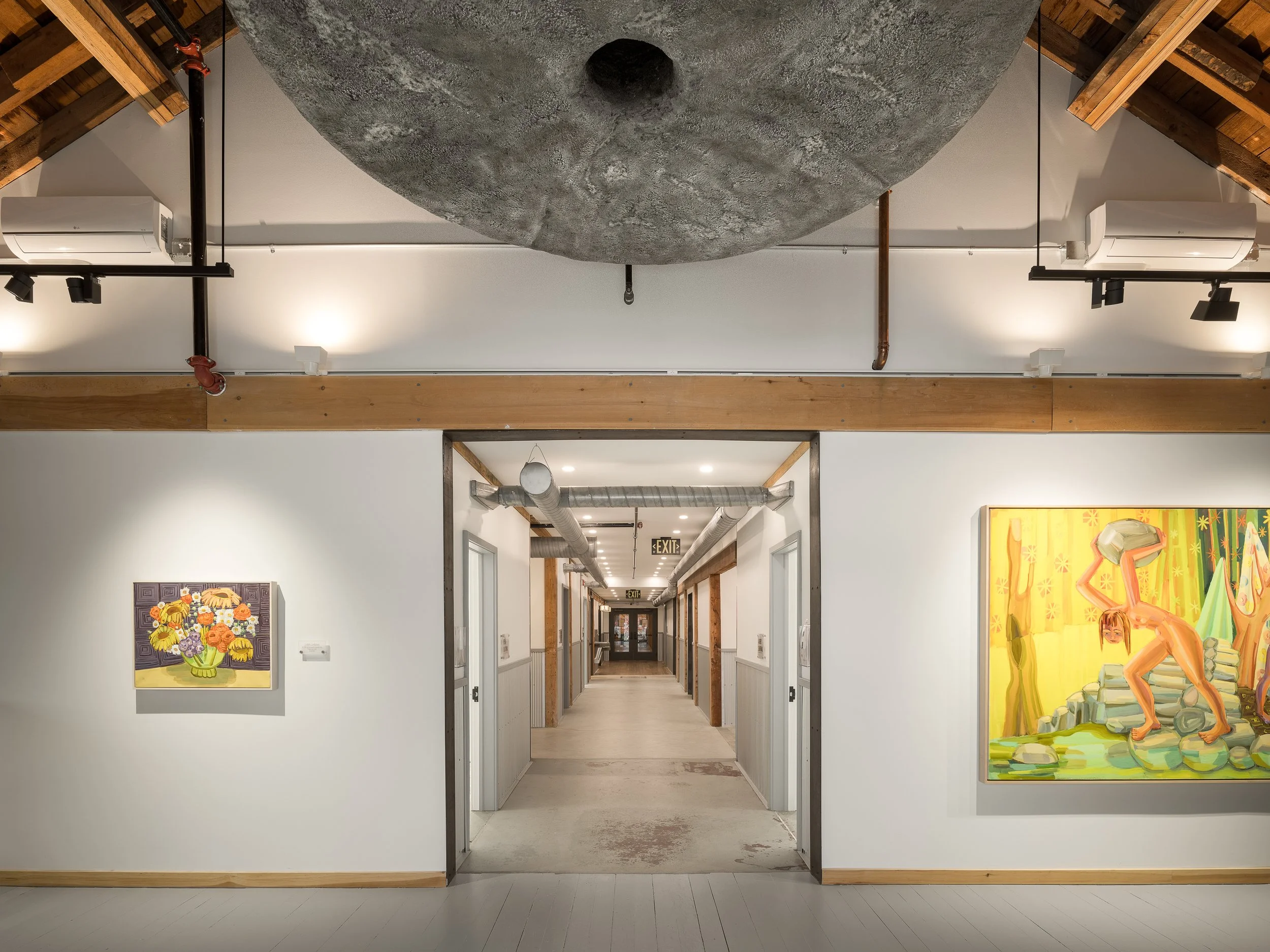 The foyer. Sculpture by Adam Frelin. Paintings Judith Linhares.