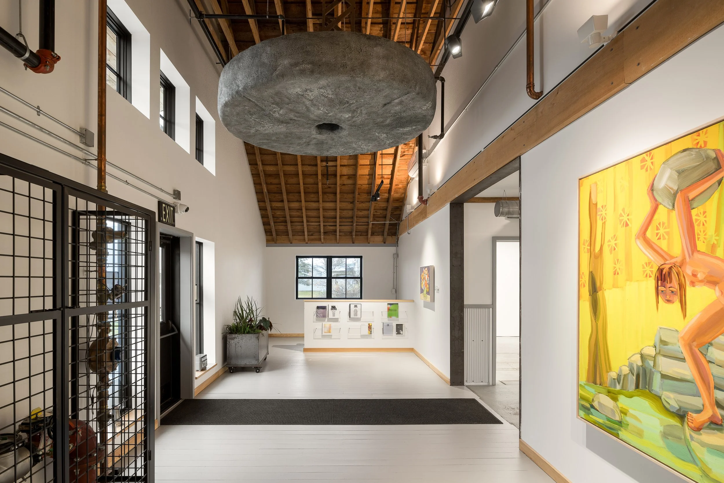 The foyer. Sculpture by Adam Frelin. Paintings Judith Linhares.