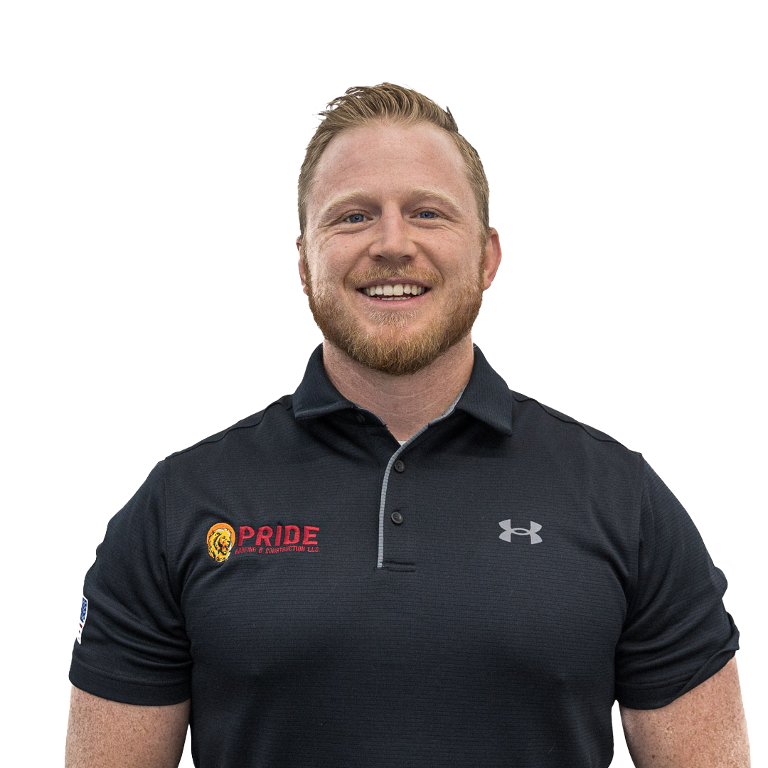 Red headed man with a beard smiling wearing a Pride Roofing Branded Polo