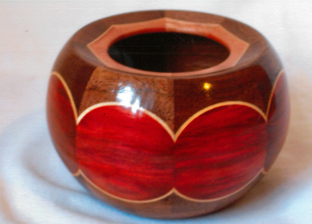 **SOLD** No. 22 $50 / 2013 Philippine Mahogany, Walnut, Dyed Maple Veneer (40 pieces) 2 3/8 H x 3 1/4 Diameter