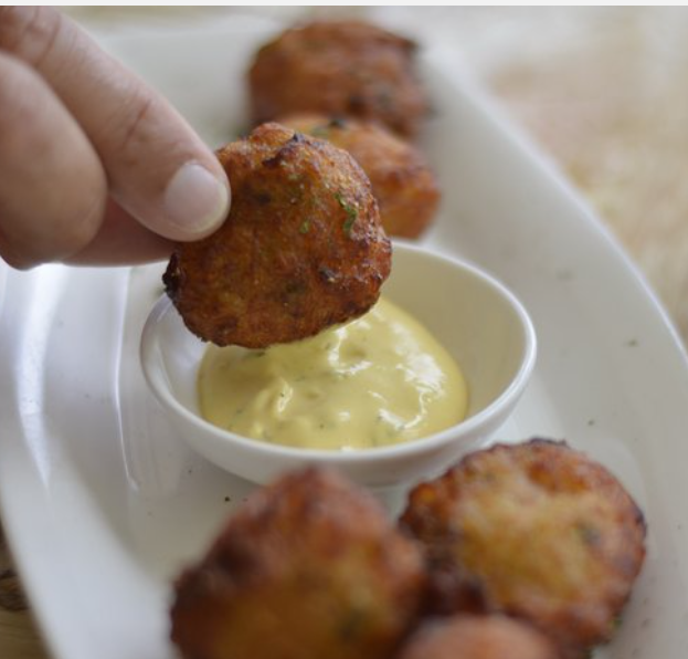 Codfish or conch cakes with a dipping sauce