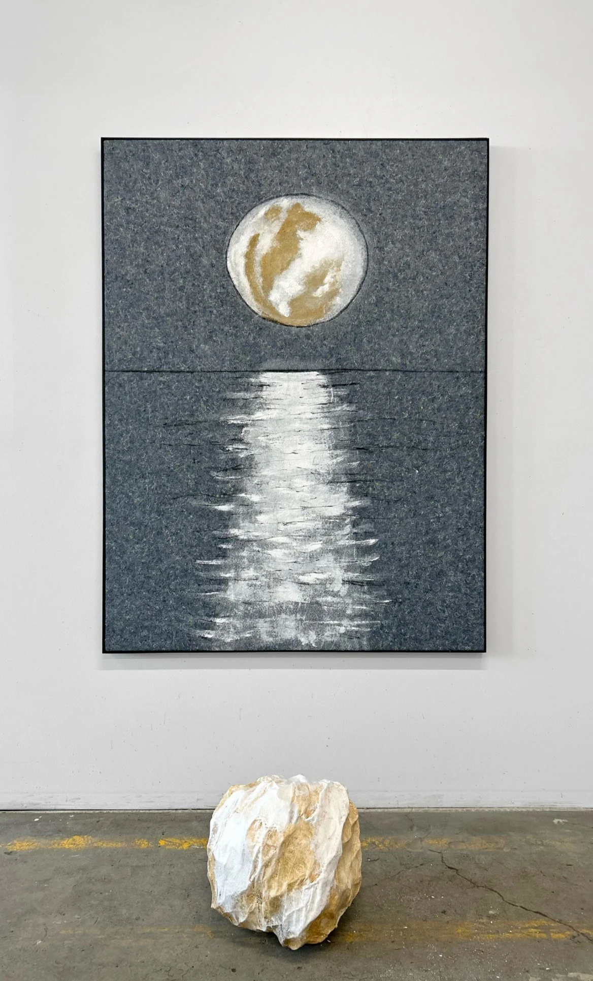 Moon, 2025 gesso paint, charcoal on felt 65 x 48, Moon 14 in diameter