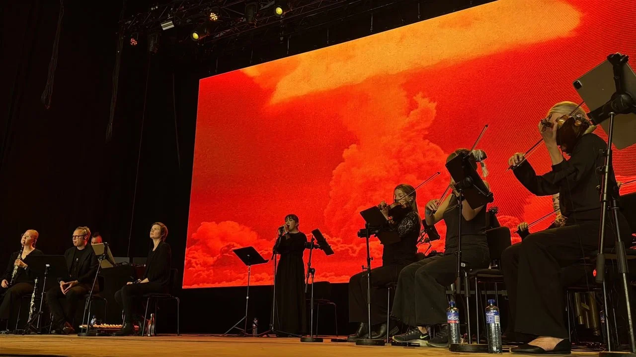 the bomb's new orchestral score was composed by Marius de Vries and performed by singer-songwriter Emilie Nicolas alongside a sixteen-piece orchestra. Photo: @kevinfordmedia