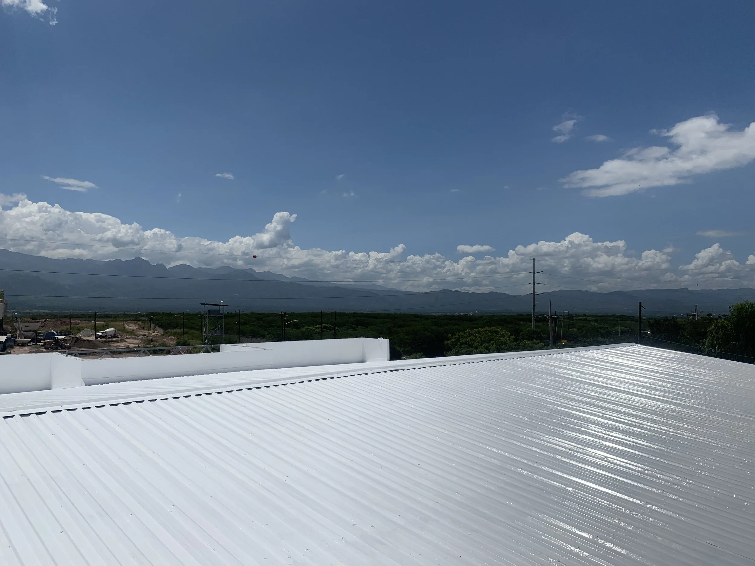 Silicone restoration membrane metal roof