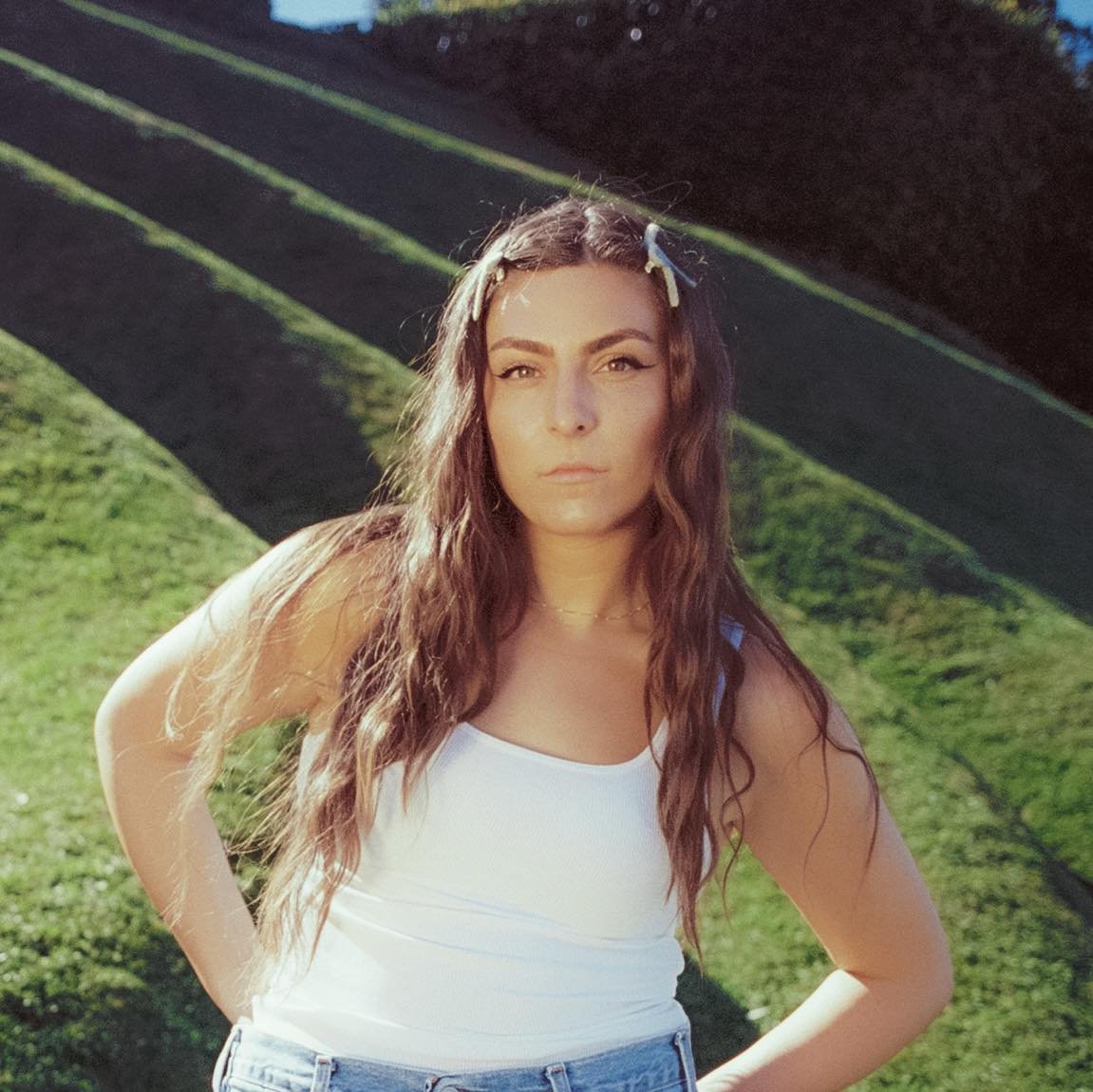 Turning Heartbreak into a Community: How Emilee Moore Uses Her Music to Help Others Feel Less Alone