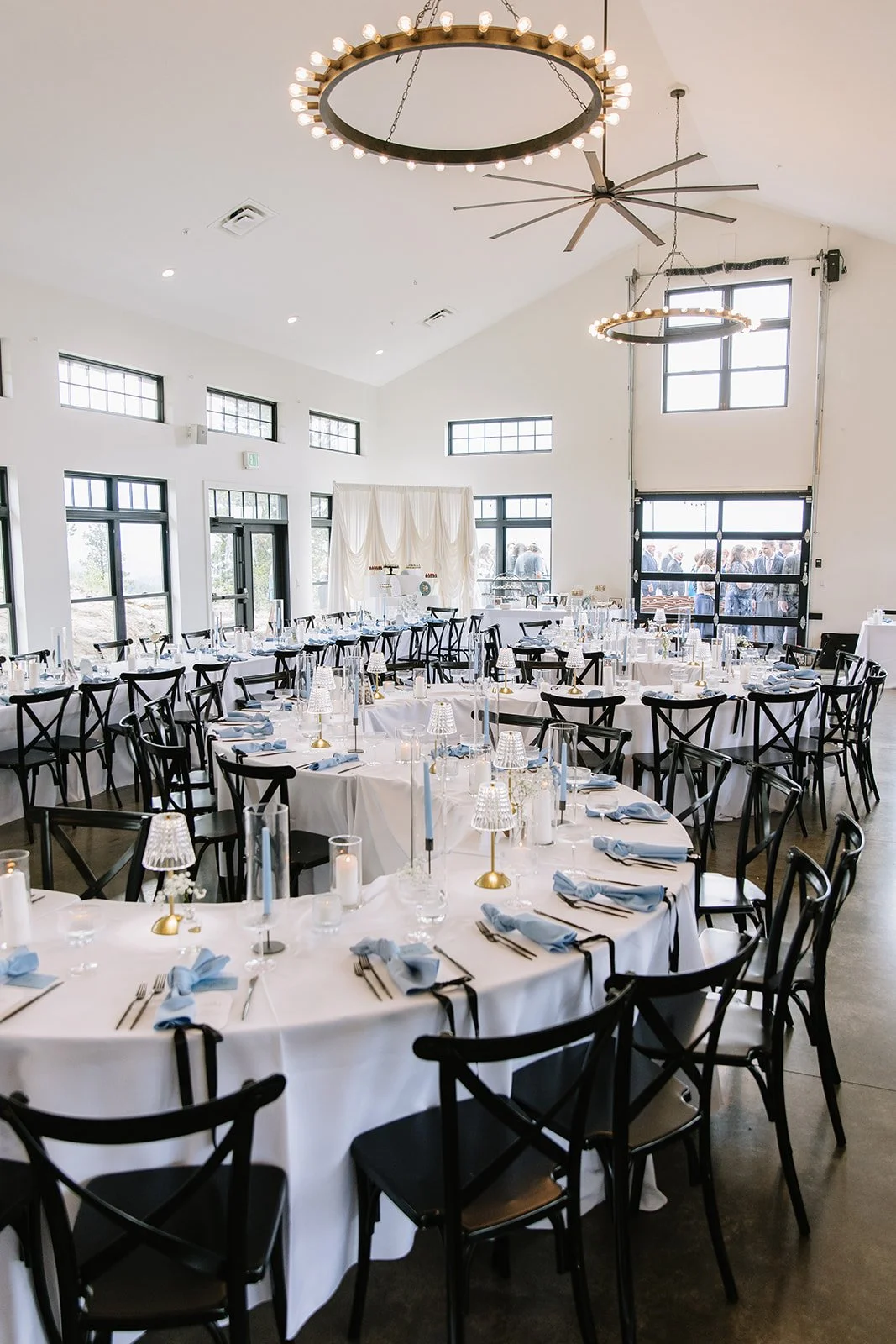 A serpentine table and reception space at North Star Gatherings in Idaho Springs